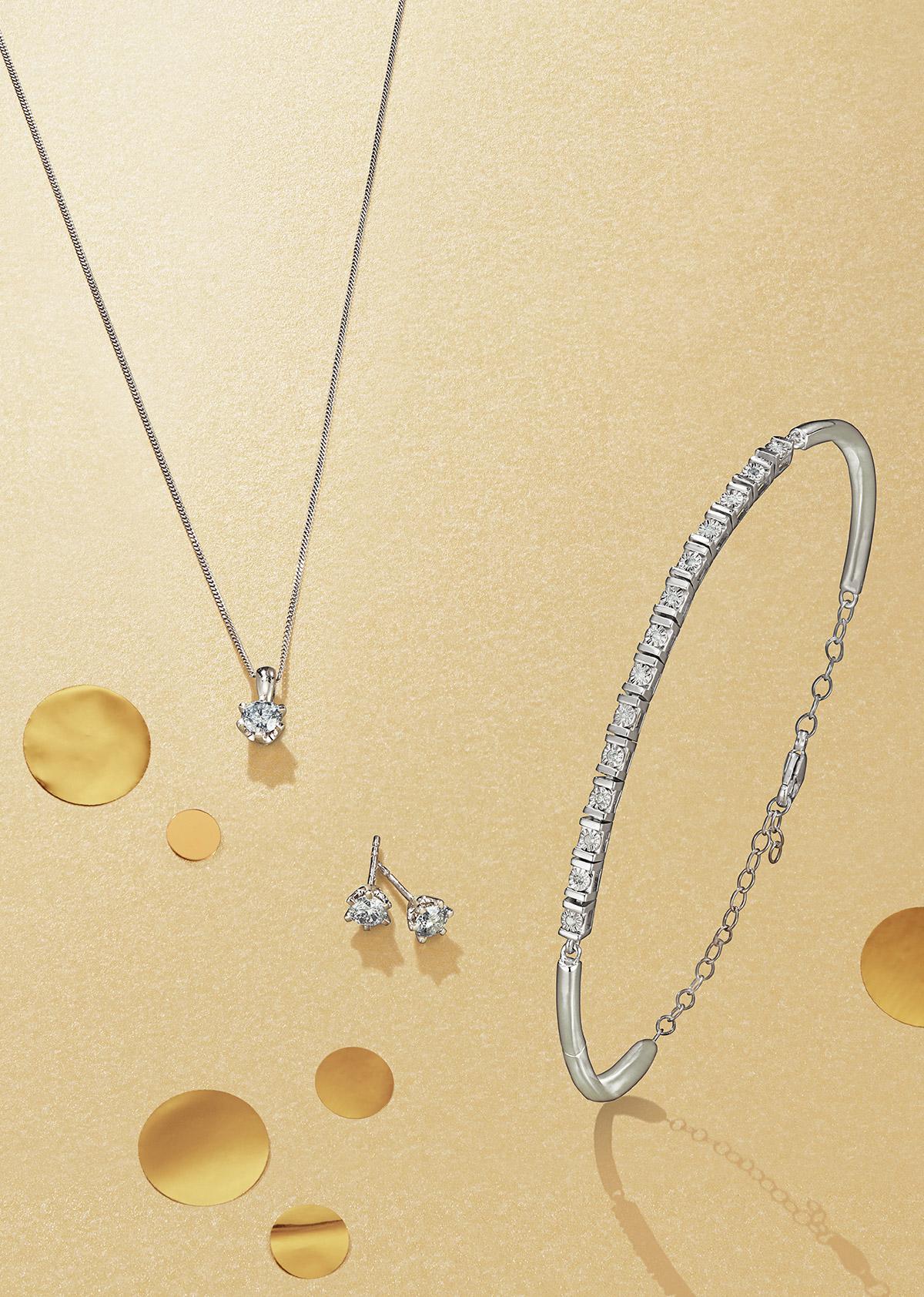 Diamond necklace, earrings and bracelet