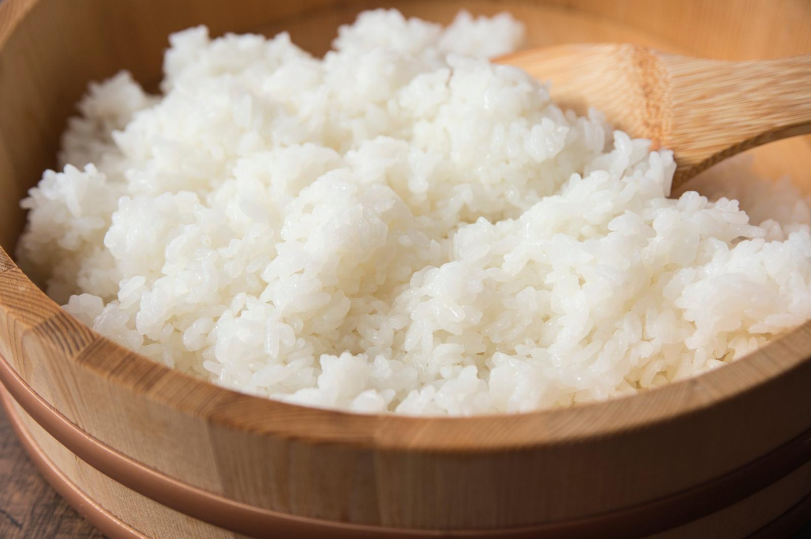 Cooked rice in a wooden barrel