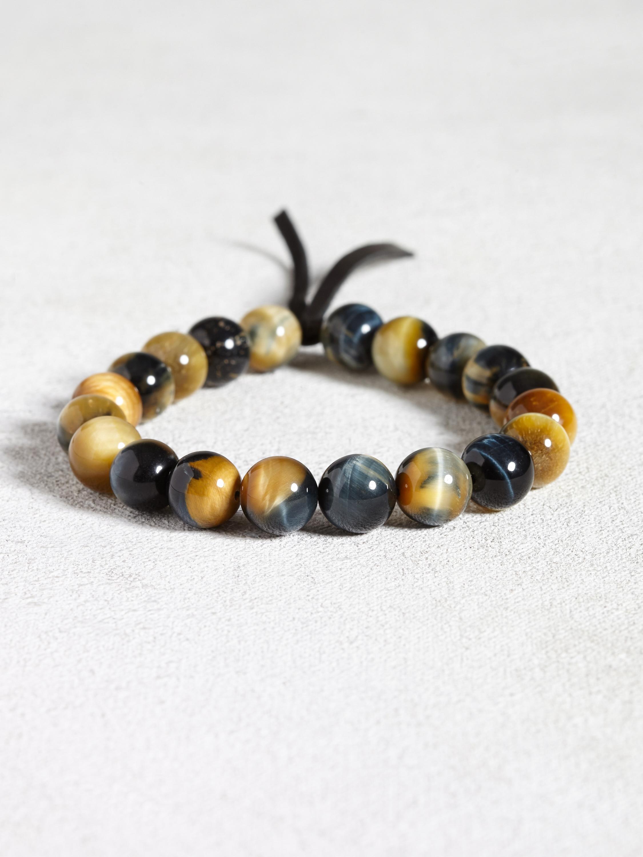 Natural Tigers Eye Bracelet with Leather Detail image number 1