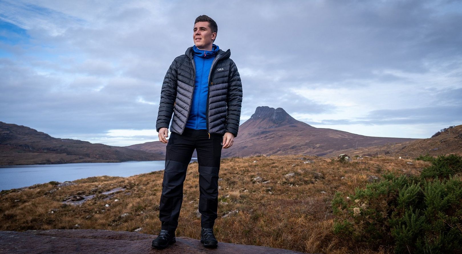 James Coutts wearing OEX gear on Stac Pollaidh mountain in Scotland