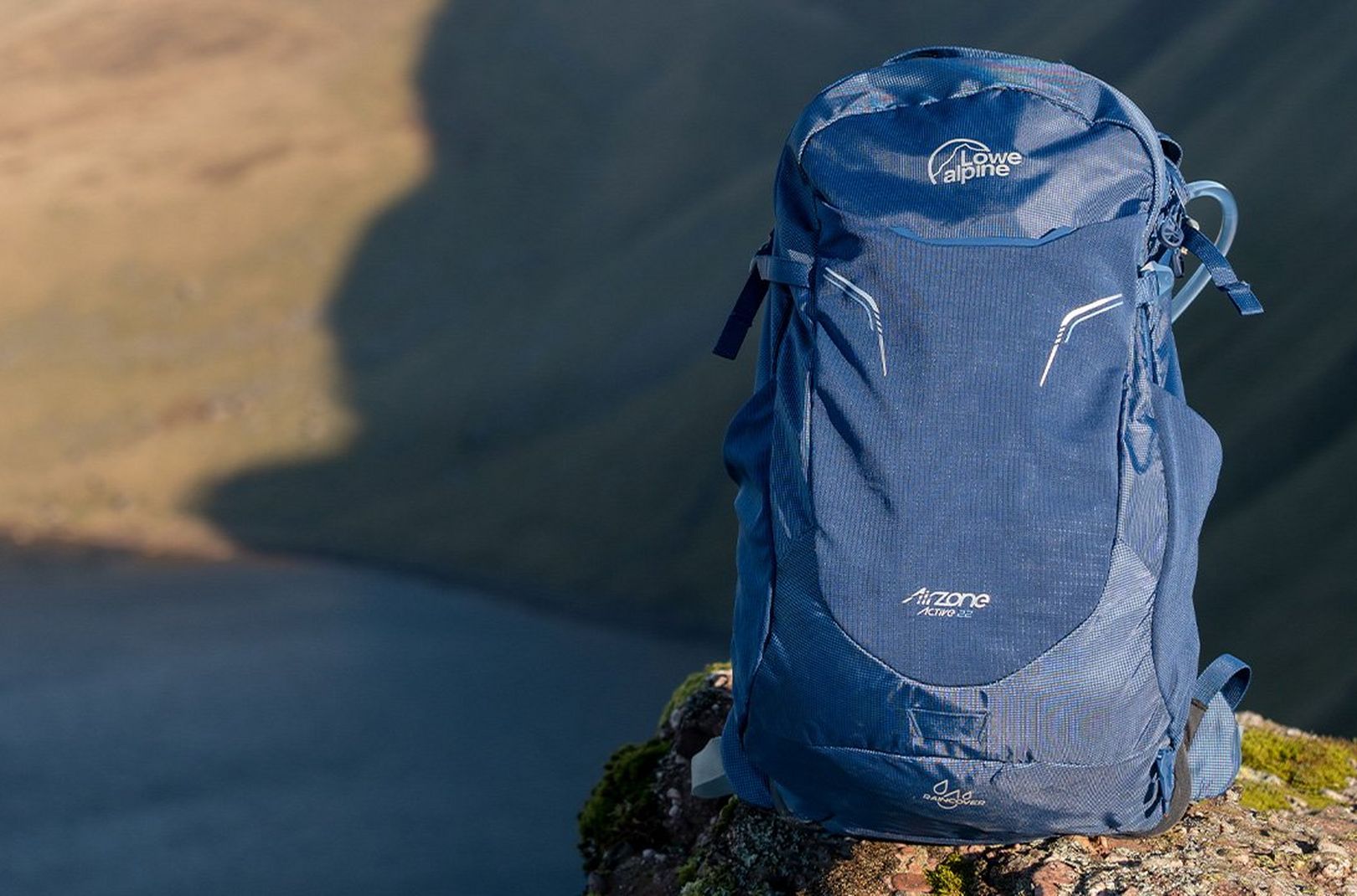 The Lowe Alpine AirZone Active 22 perched on a rock during a test hike