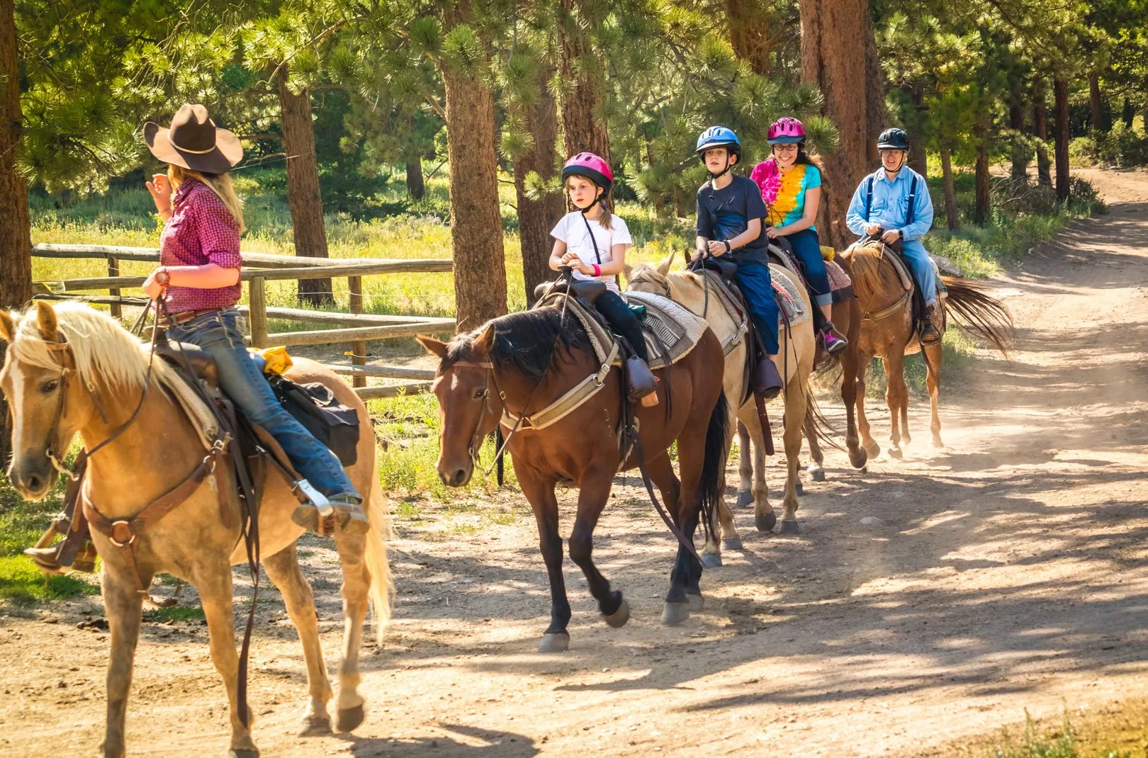 family horse riding together