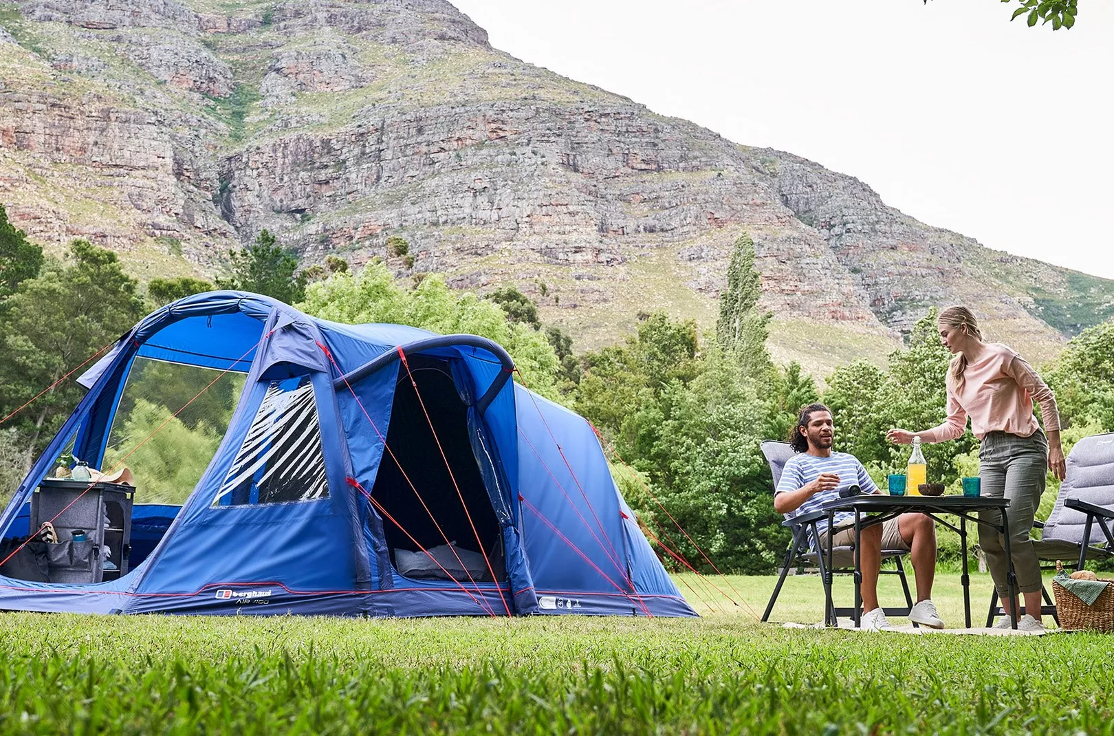 Couple sat outside of Air 400 tent