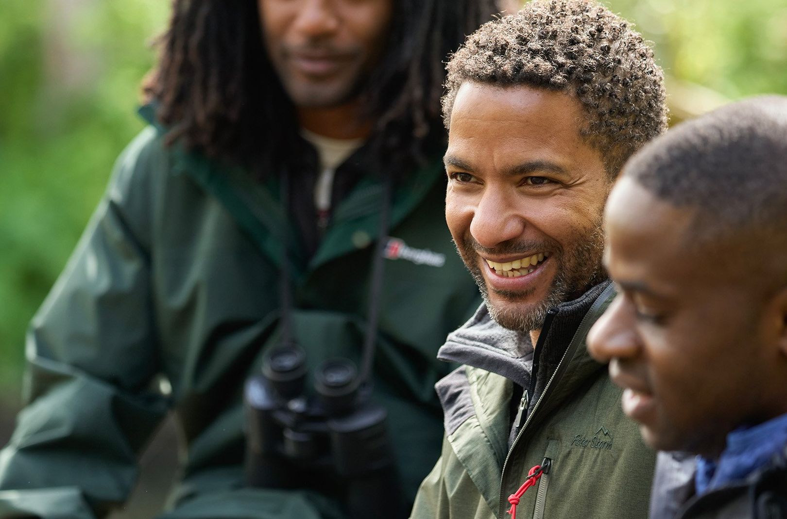 Sean Fletcher talking and laughing with Ollie Olanipekun and Nadeem Perera from Flock Together