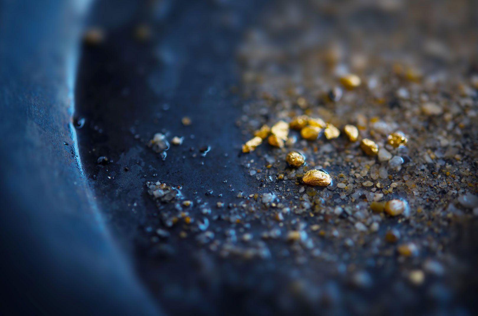 Gold pieces in pan