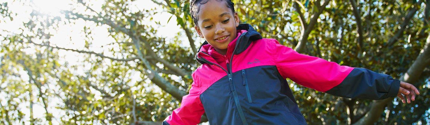 Young girl wearing a waterproof jacket