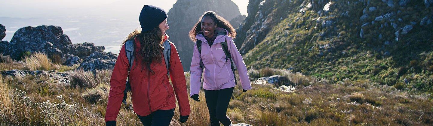 Two women wearing waterproof jackets