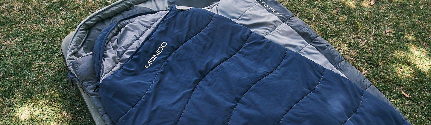 Sleeping bag on top of a sleeping pad