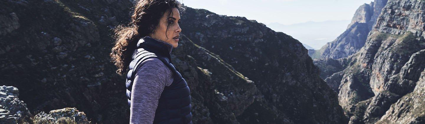 Person wearing a gilet in the mountains