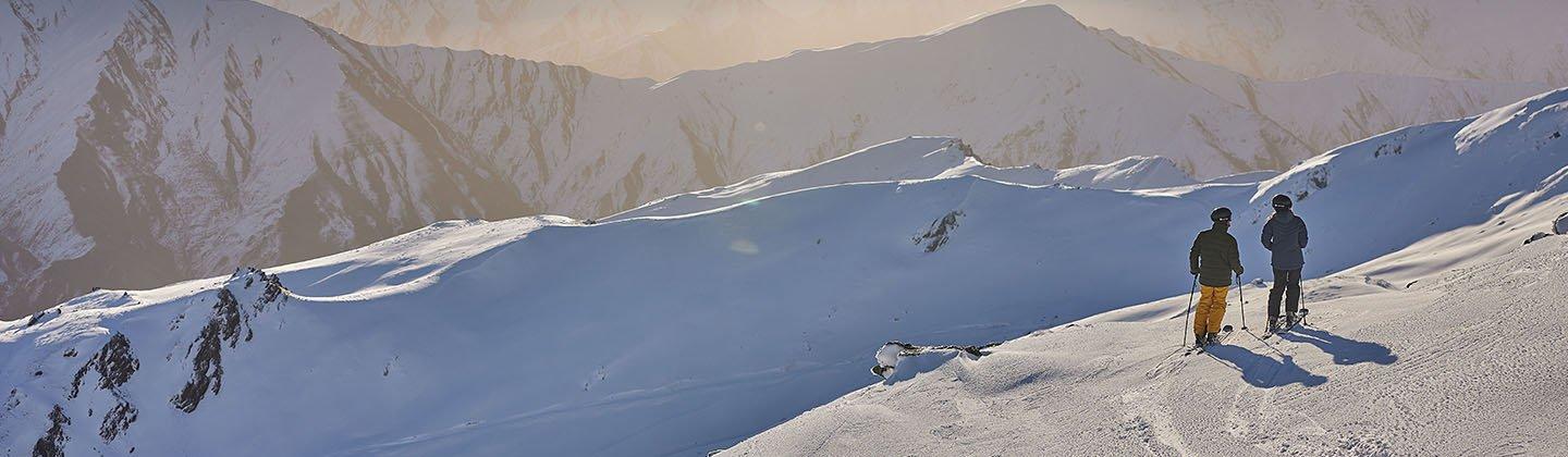 Wide photo of snow covered mountains