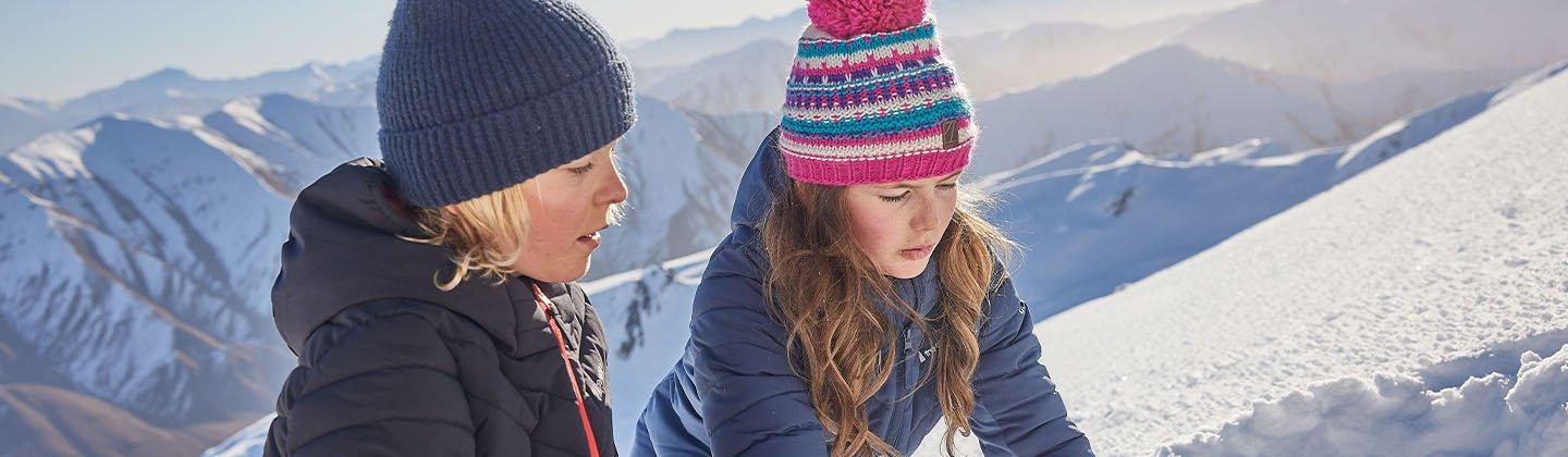 Closeup of kids playing in the snow