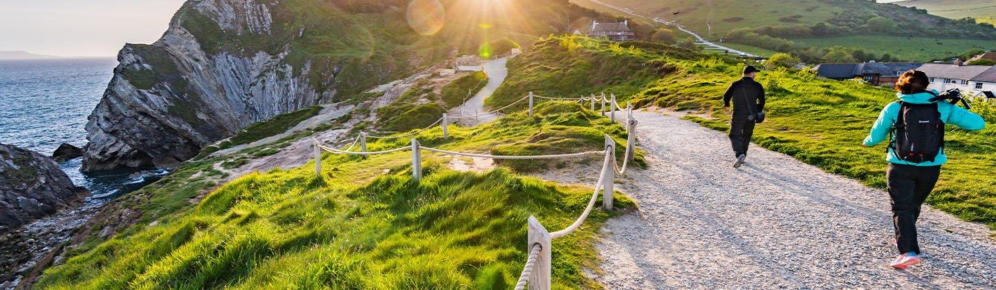 Coastal walk down a path with guided rope