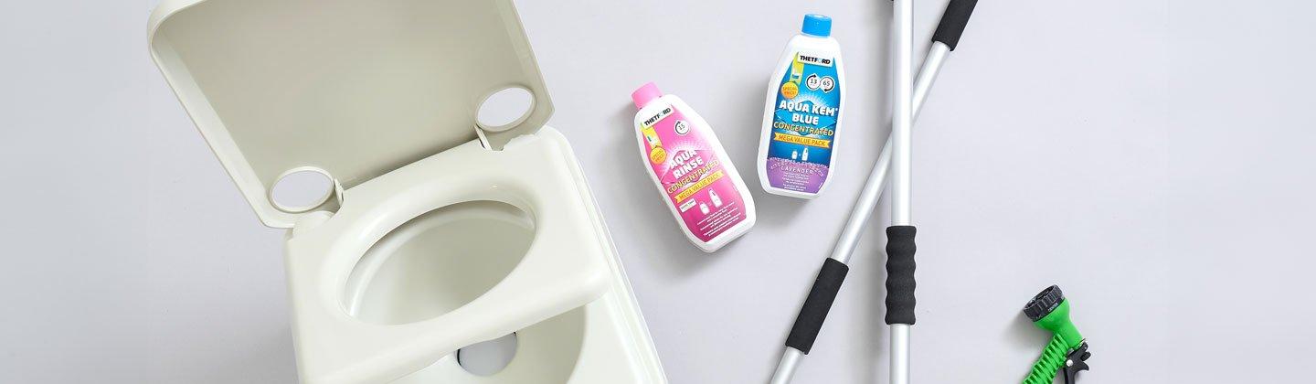 Flatlay image of various toilet and cleaning products