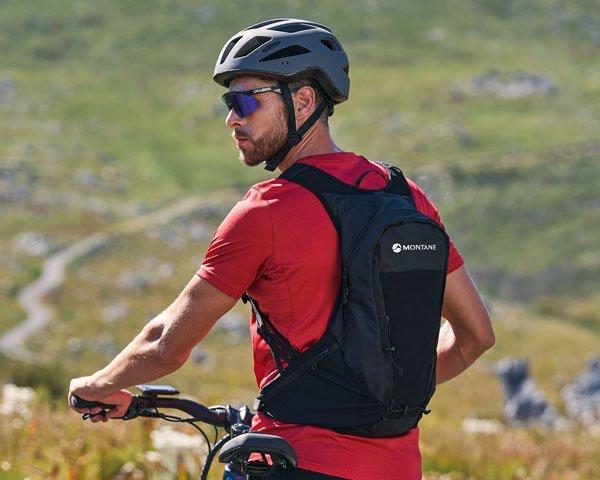 A person wearing a small hydration vest