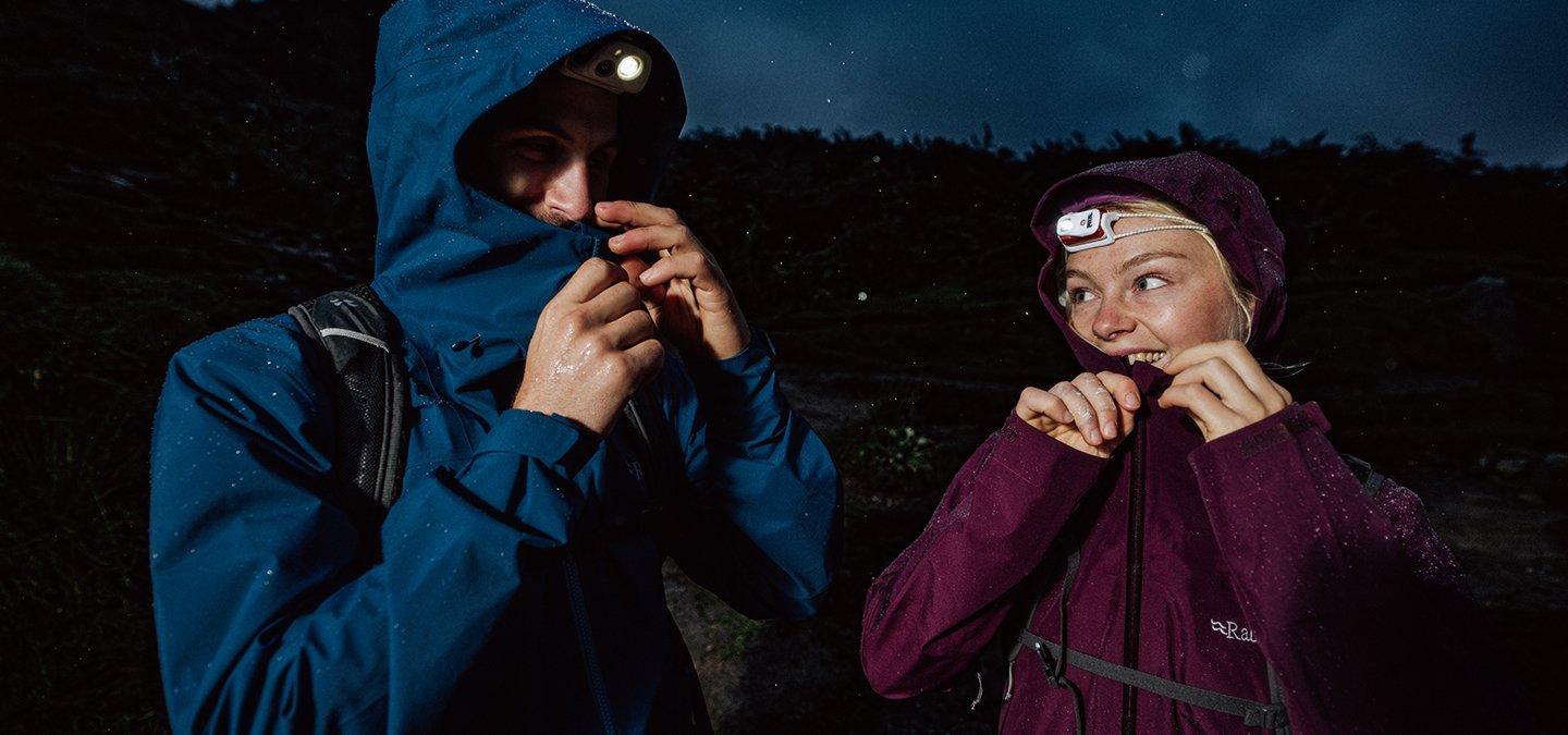 Group of people at a festival erecting their pop-up tents