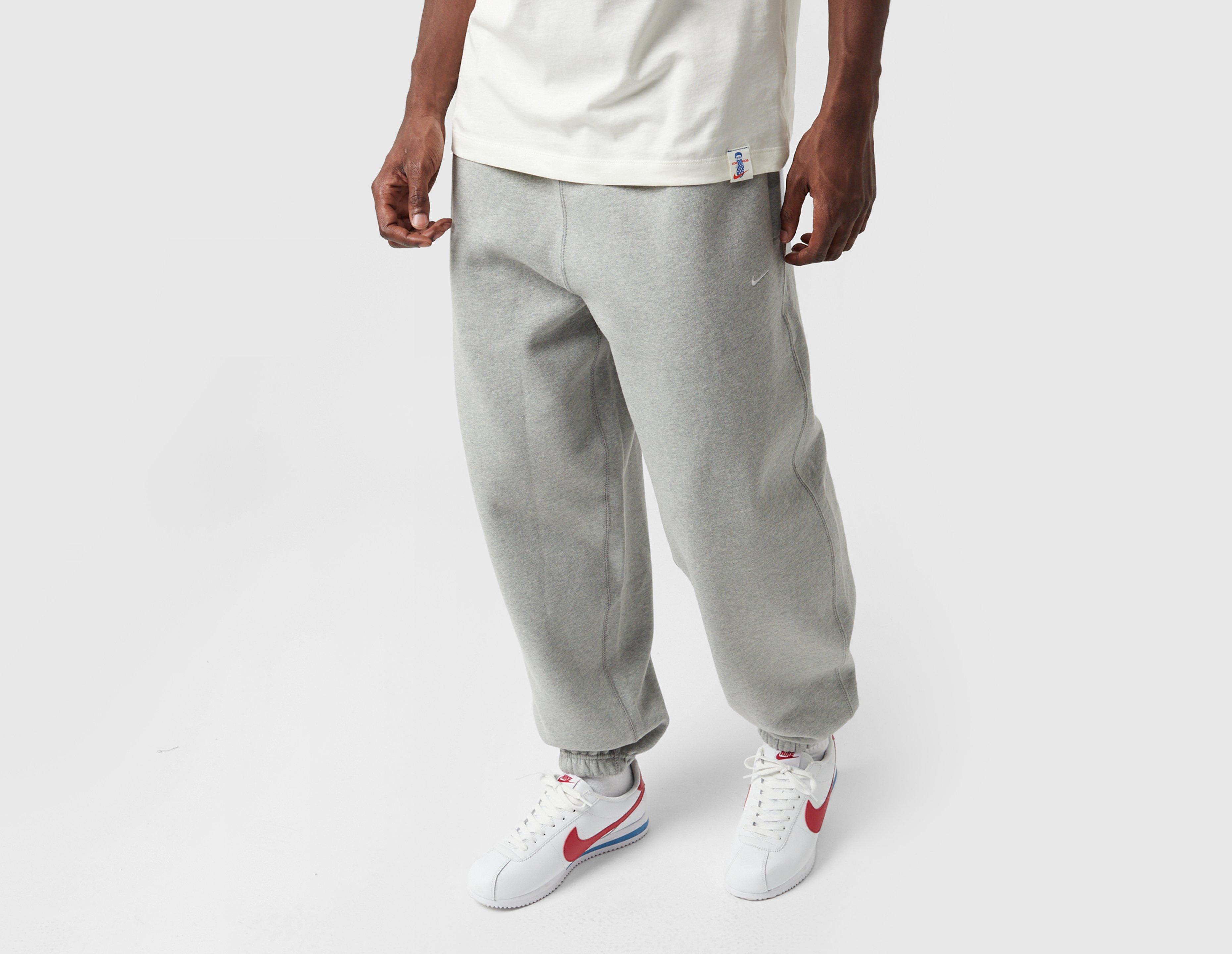 Nike Solo Swoosh Fleece Pants Grey in  Men's Size Medium