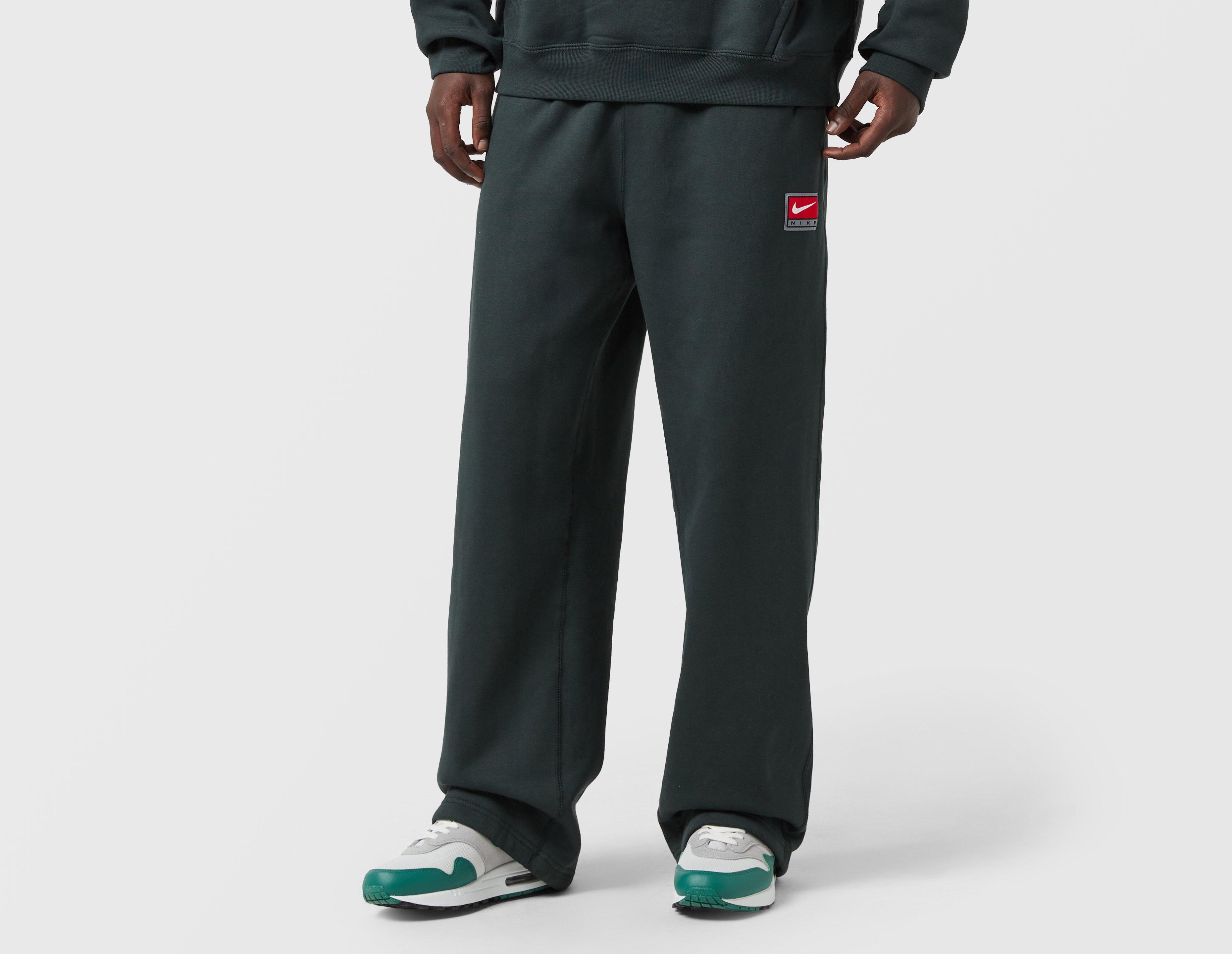Nike Solo Swoosh Open Hem Fleece Pants Green in  Men's Size Medium