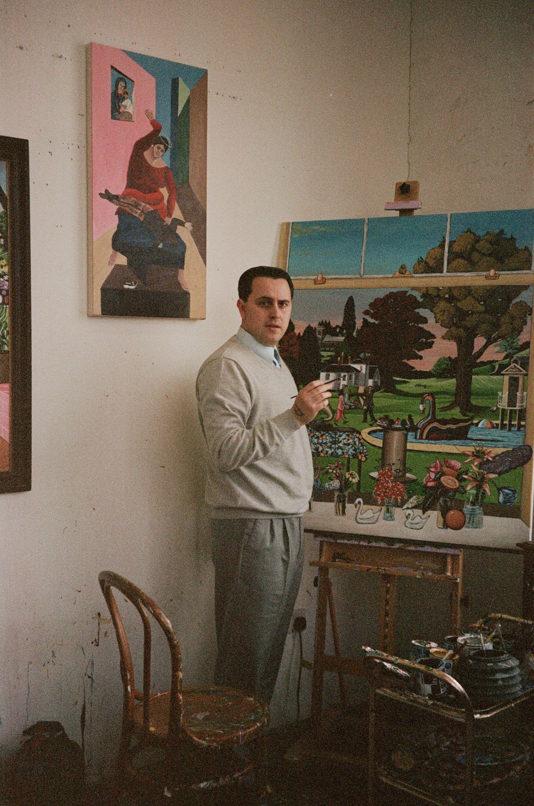 Conor Murgatroyd with his painting inspired by Liberty LBTY Fragrance Liberty Maze