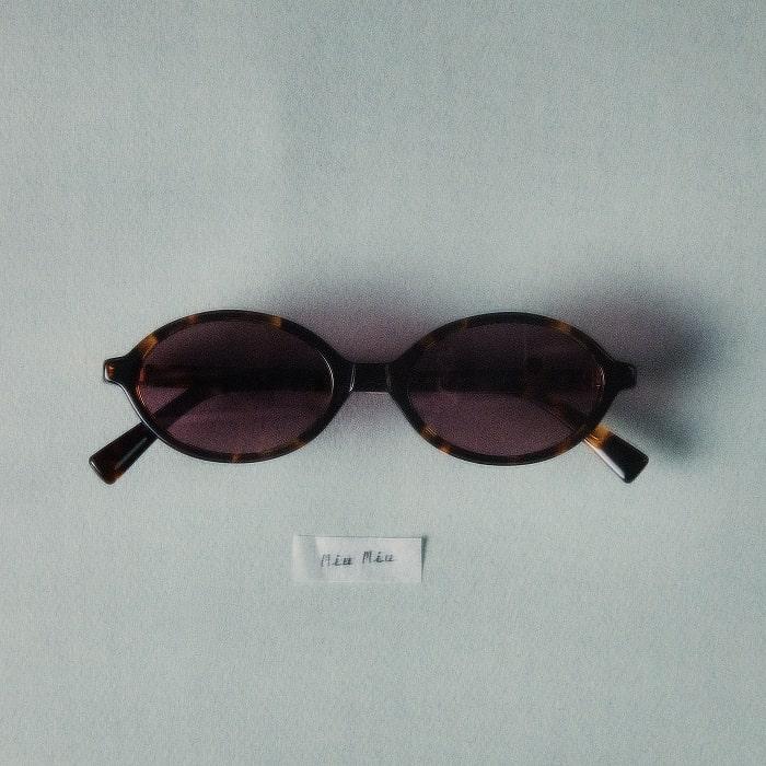 Miu Miu Oval Sunglasses