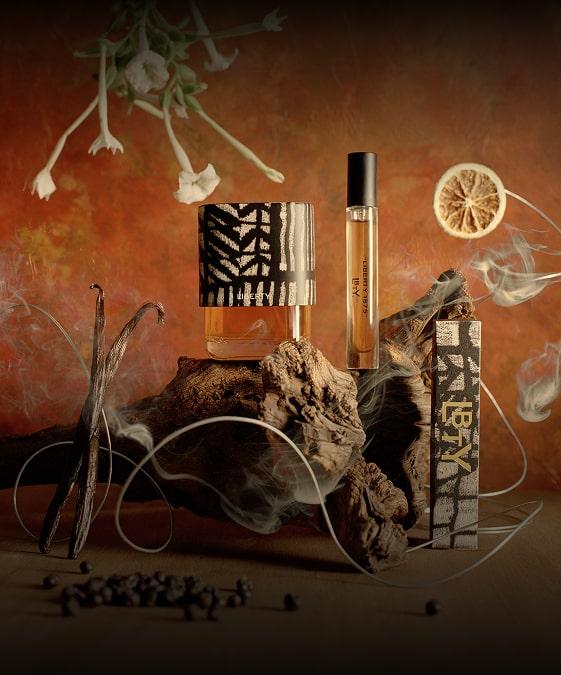 Liberty LBTY. Fragrance perfume bottle with a black and white cap