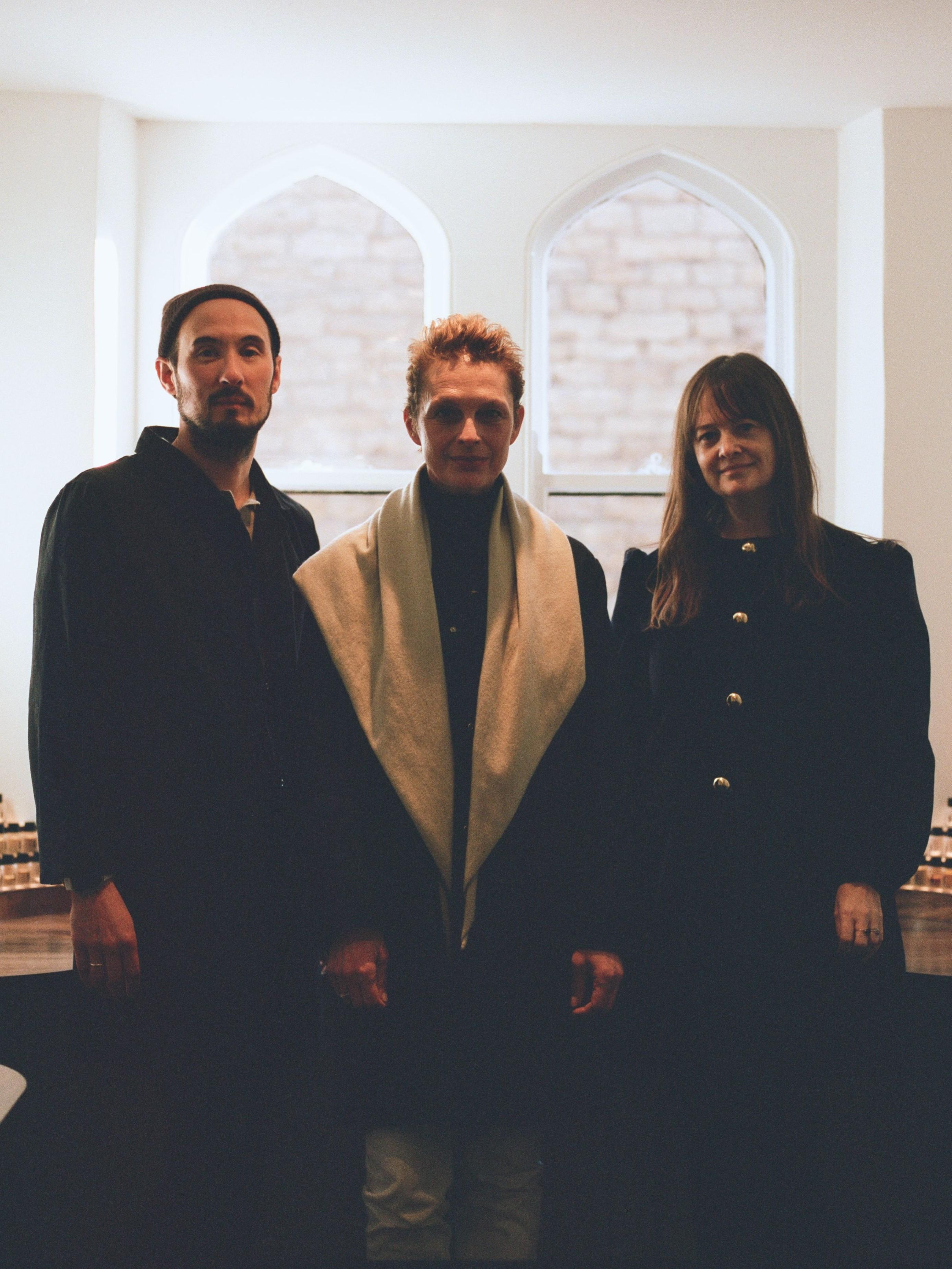 The two founders of Commune, Kate Neal and Rémy Paringaux, stand in front of their Somerset HQ