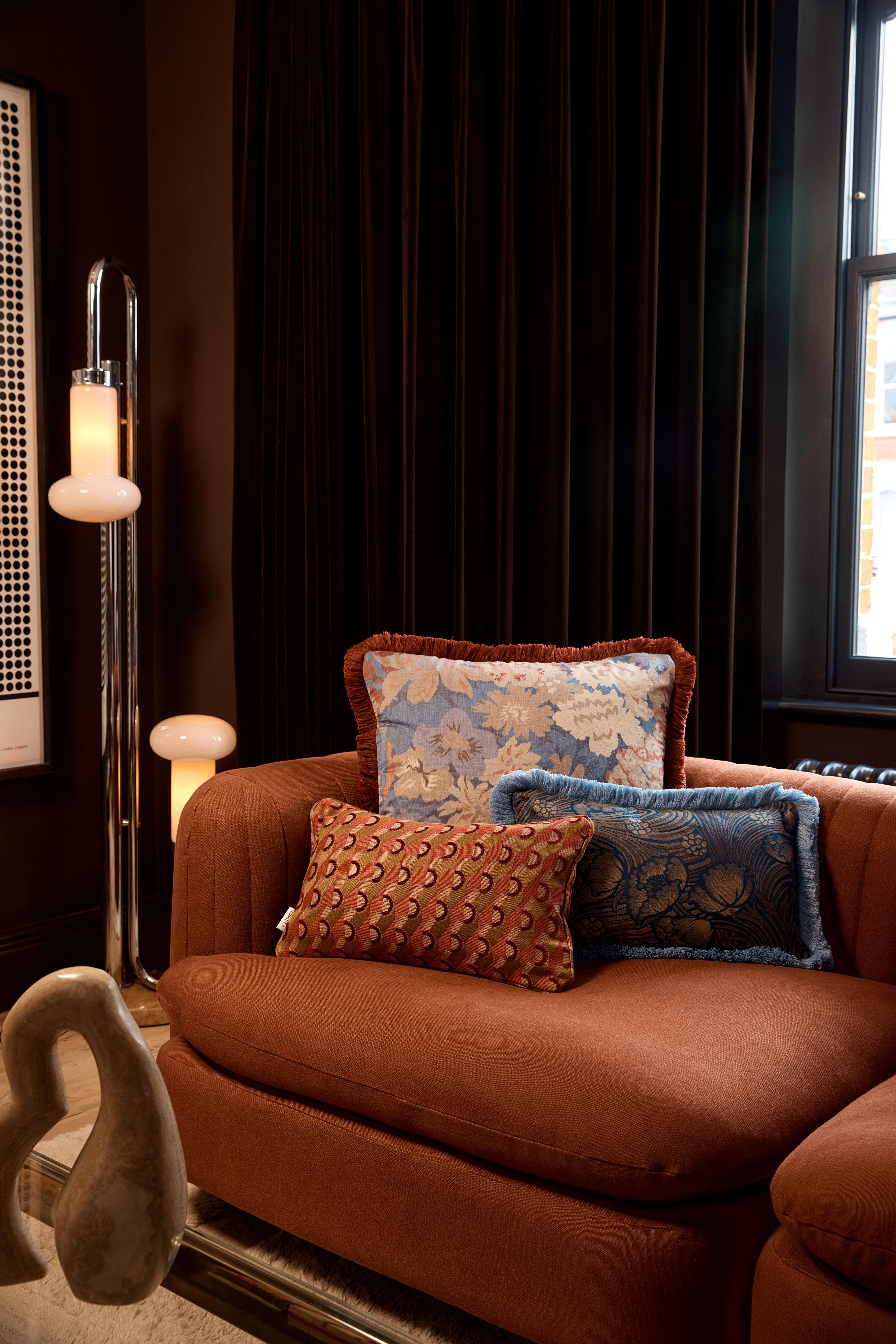 living room nook with cushions on chair
