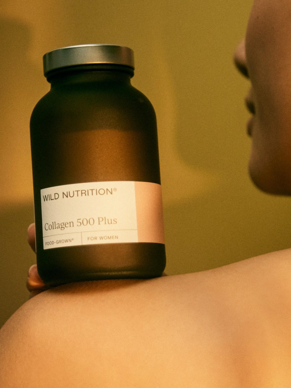 A brown glass bottle of Wild Nutrition supplements