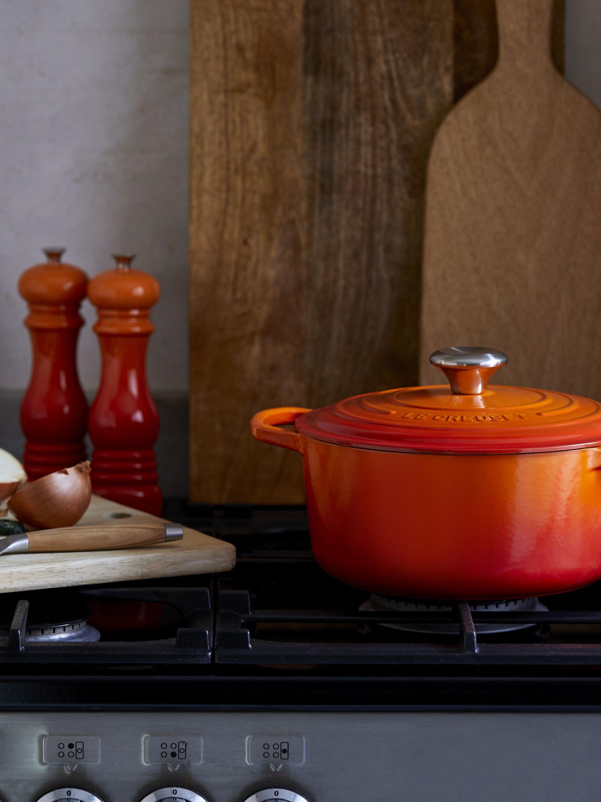 Le Creuset's casserole and salt and pepper grinders in volcanic