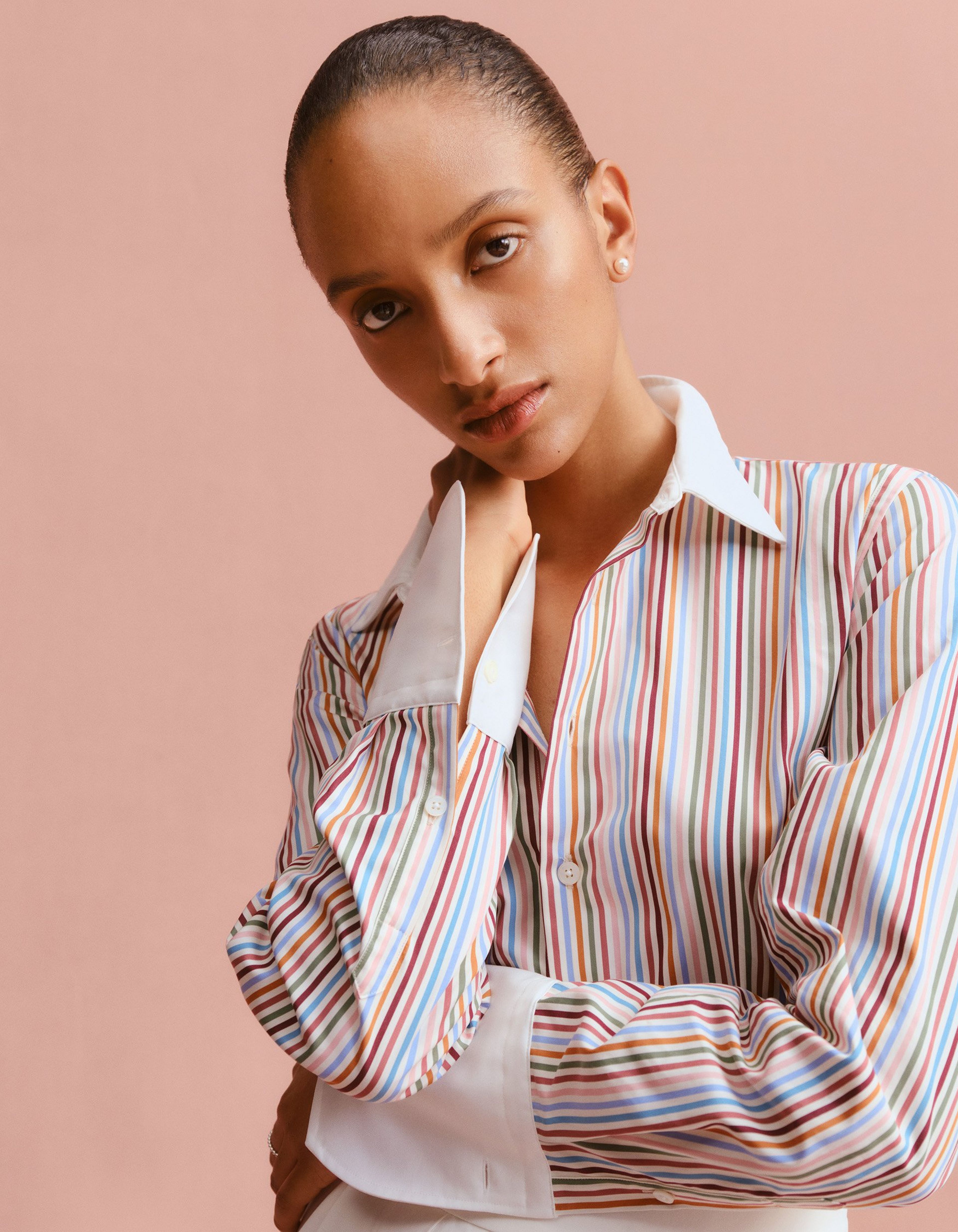 A women wears a Bengal Stripe shirt with contrasting cuffs and collar