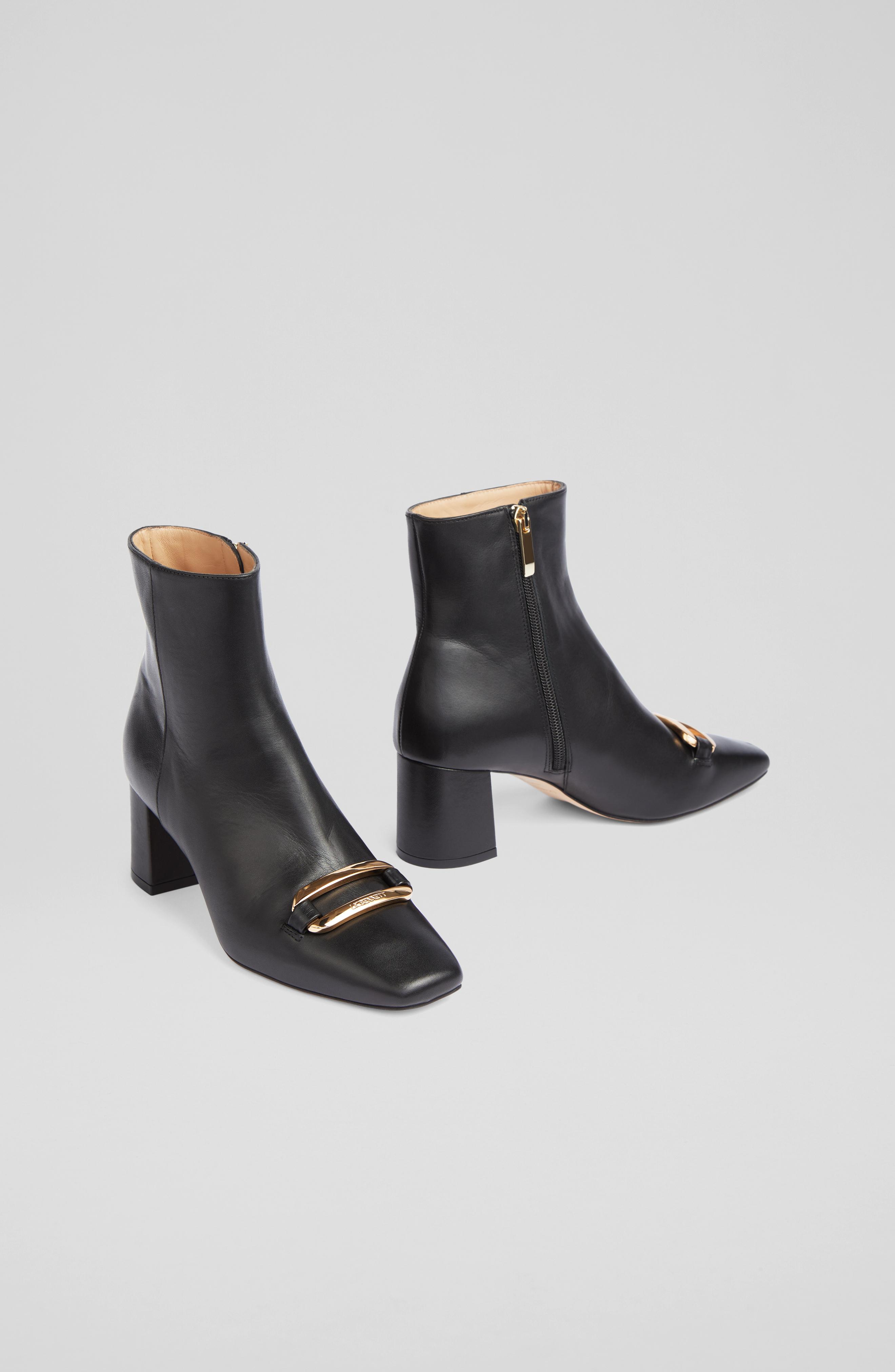 Novella Black Leather Gold Bar Ankle Boots Mid Heel
