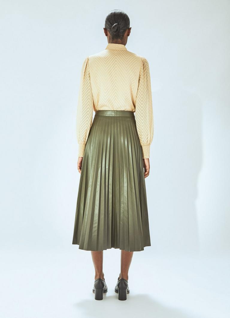 Leather pleated skirt 7 little words hot sale