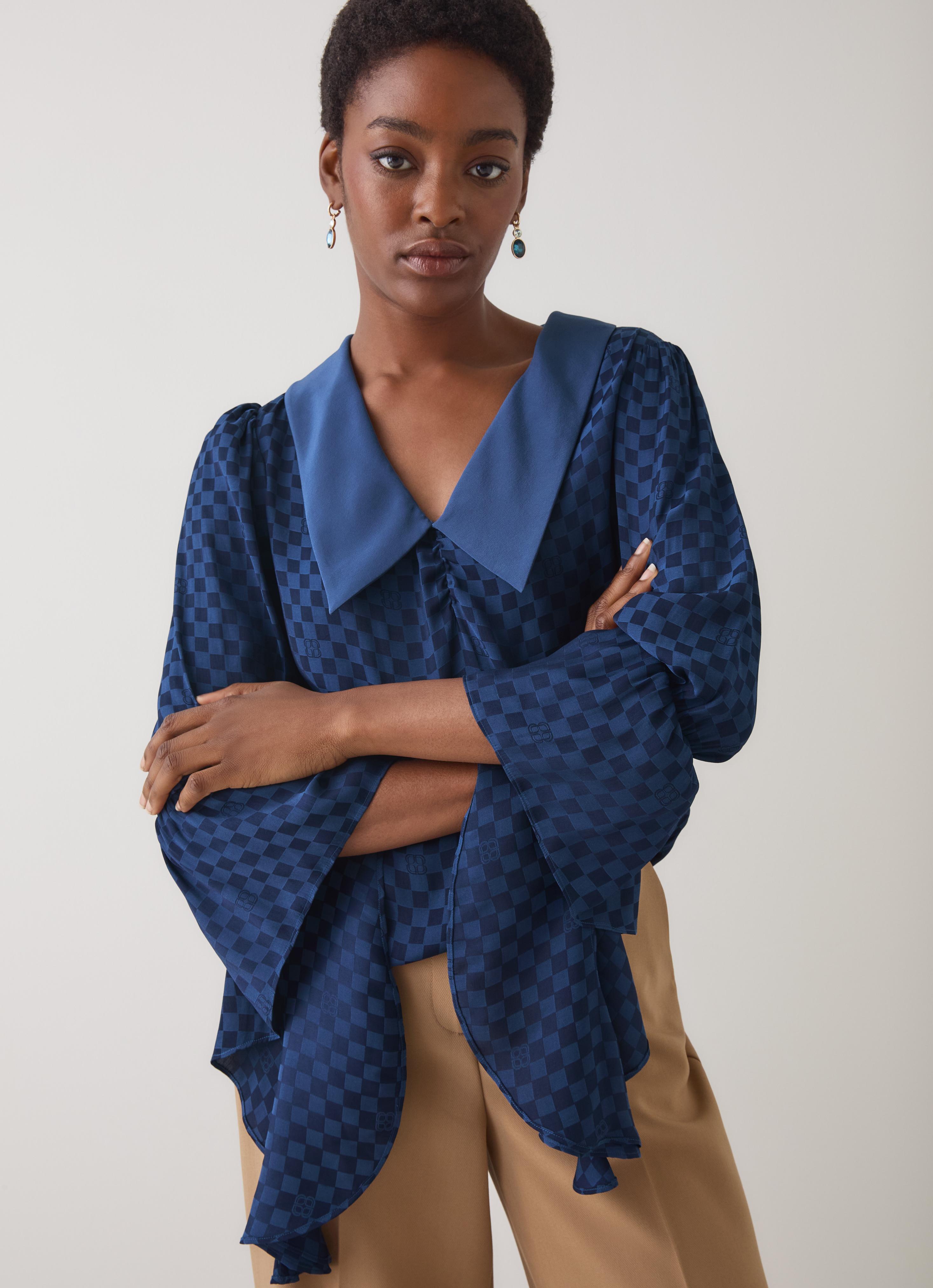 Clarita Midnight Exaggerated Sleeve V-Neck Top