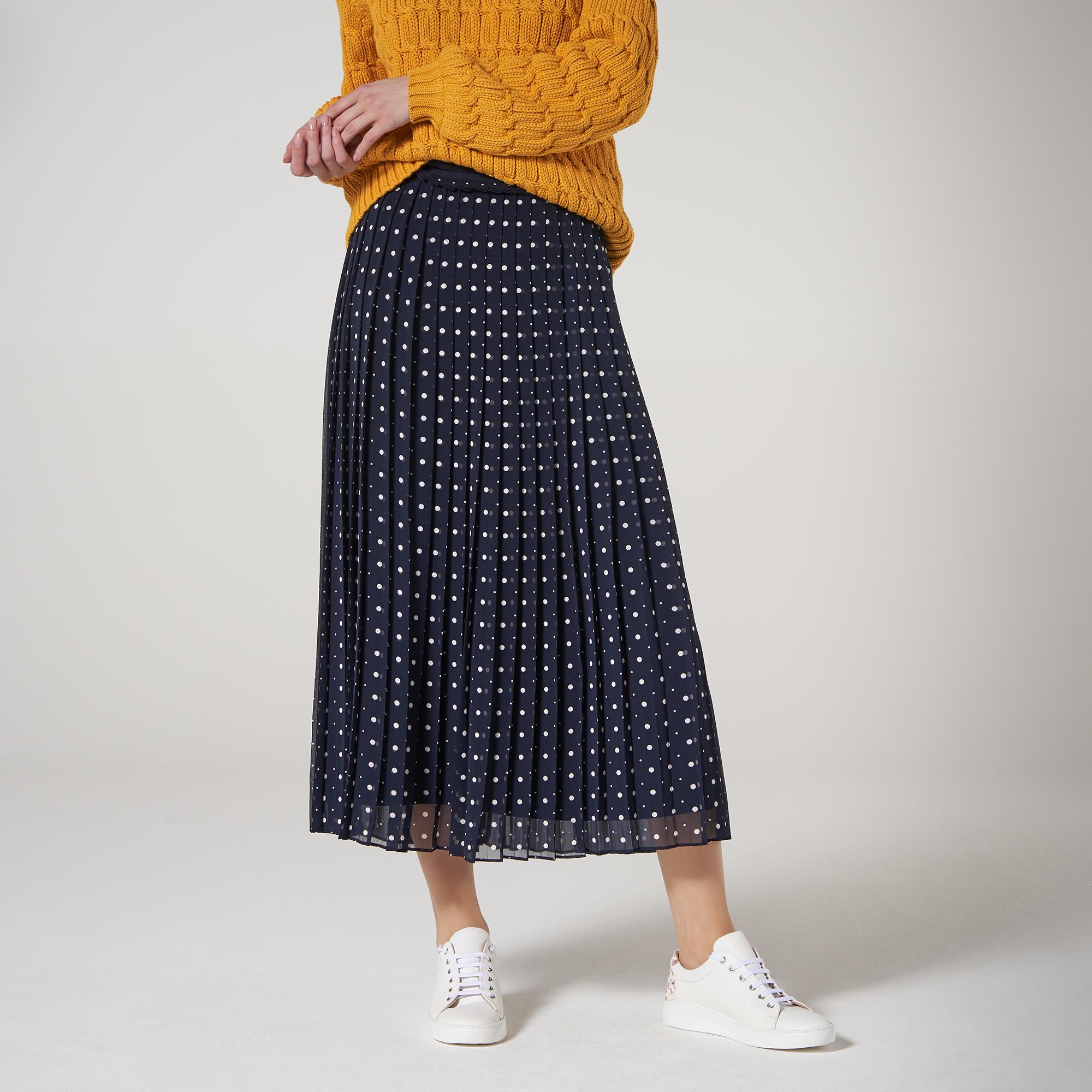 navy and white spotted skirt