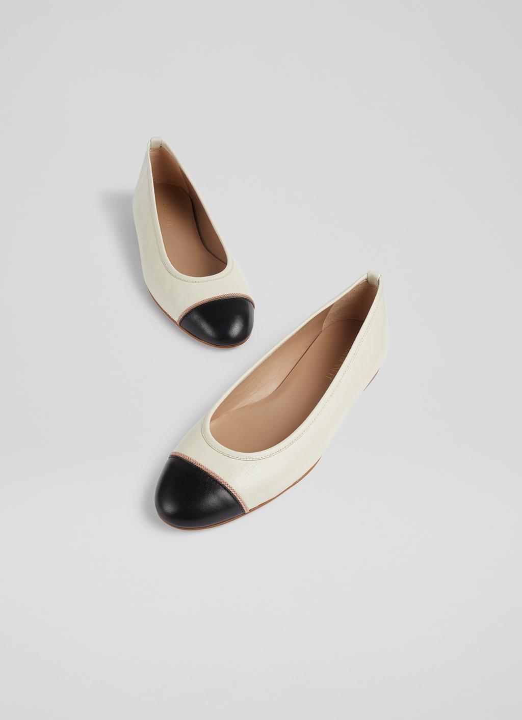 Introducir 111+ imagen cream shoes with black toe