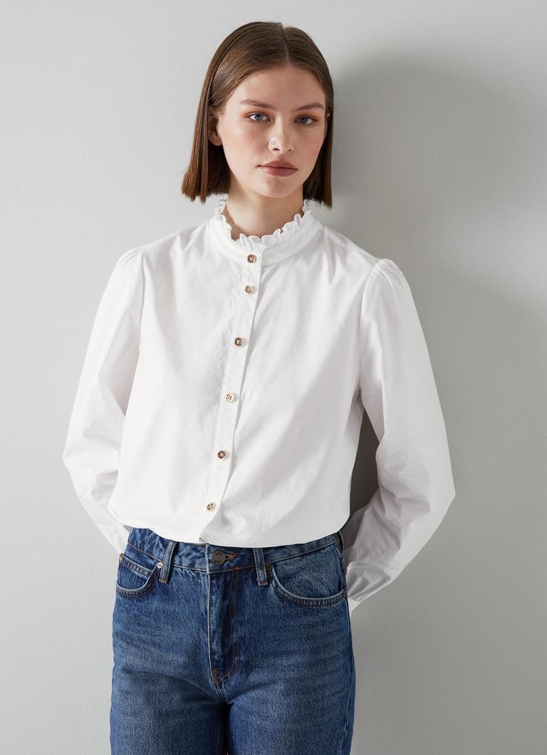 White ruffle online blouse uk