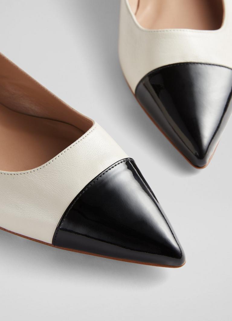 Black & cream deals shoes