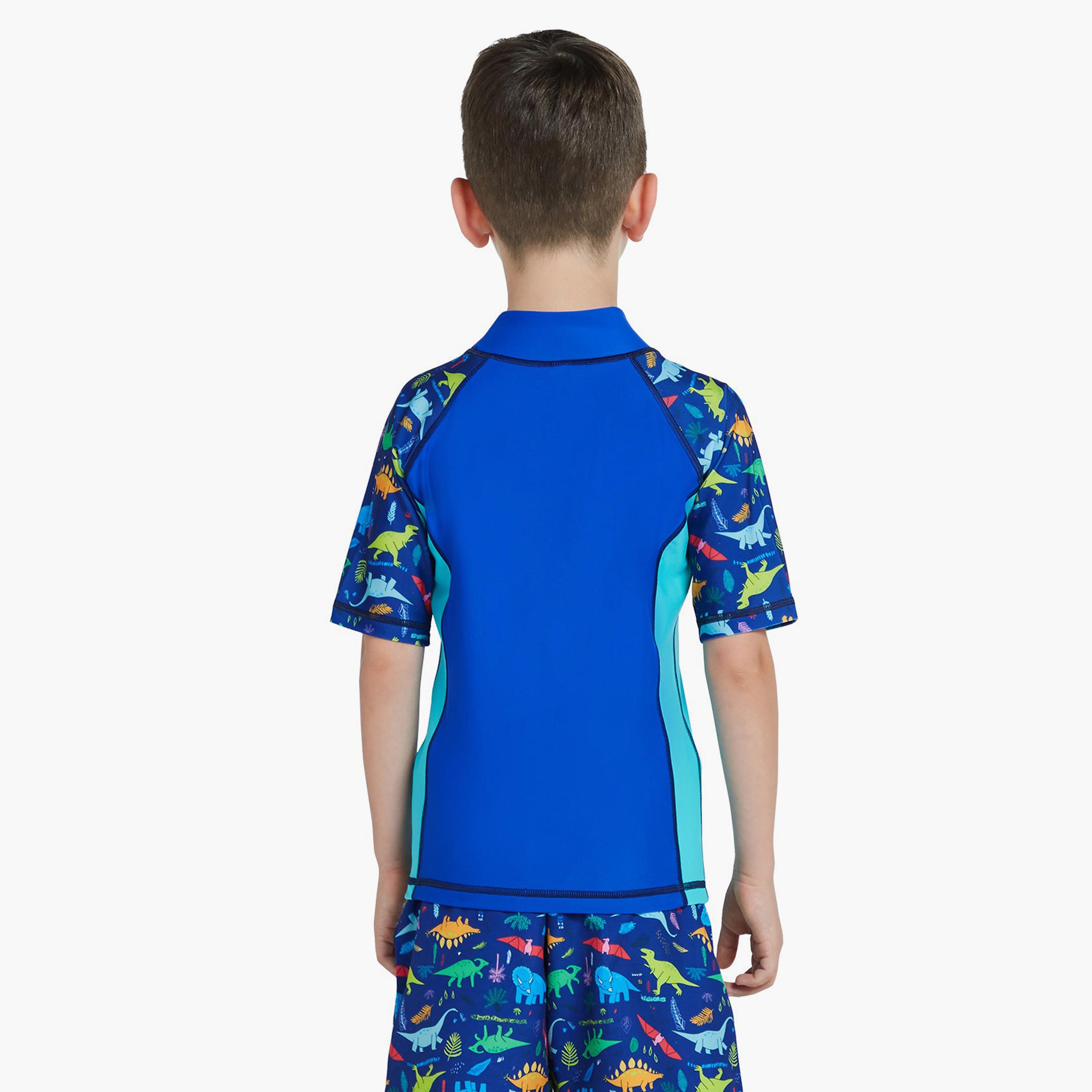 كويغا - قميص واقي من الشمس بأكمام قصيرة للأولاد، أزرق اللون-boys-clothing-sportswear-swimwear-image-2