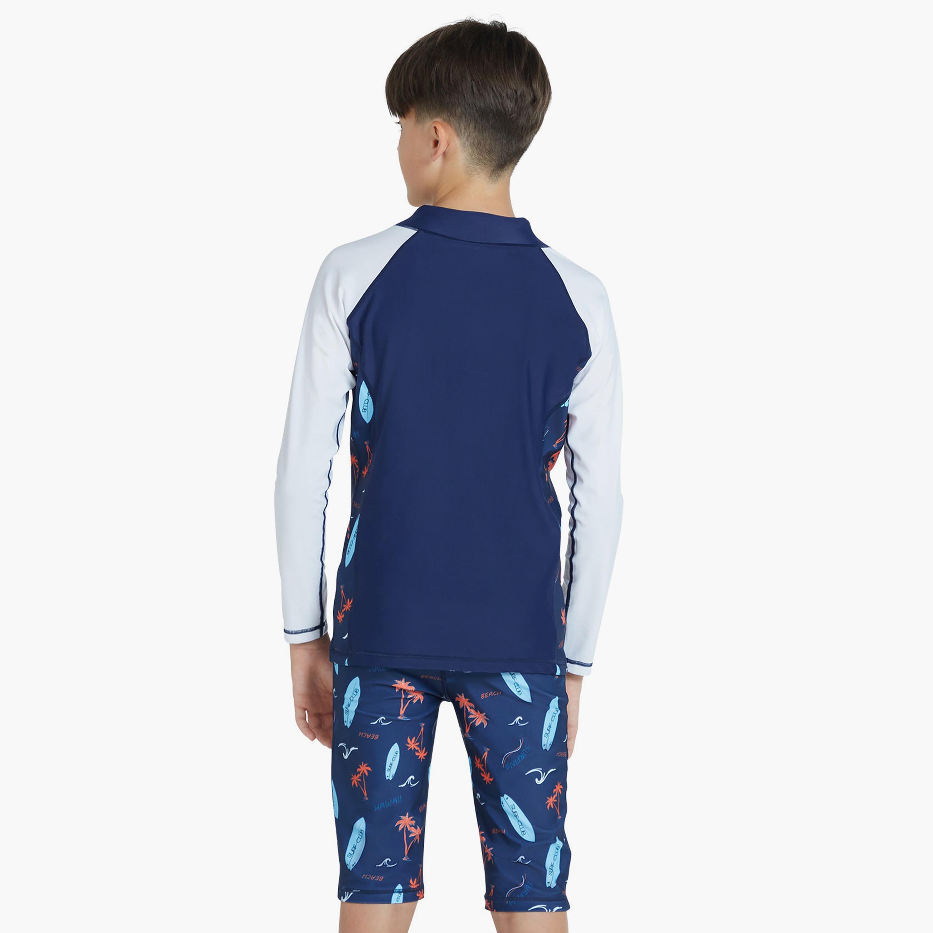 كويغا - قميص واقي من الشمس بأكمام طويلة للأولاد- كحلي بنقشة النخيل الخوخية-sports-boys-clothing-swimwear-image-2