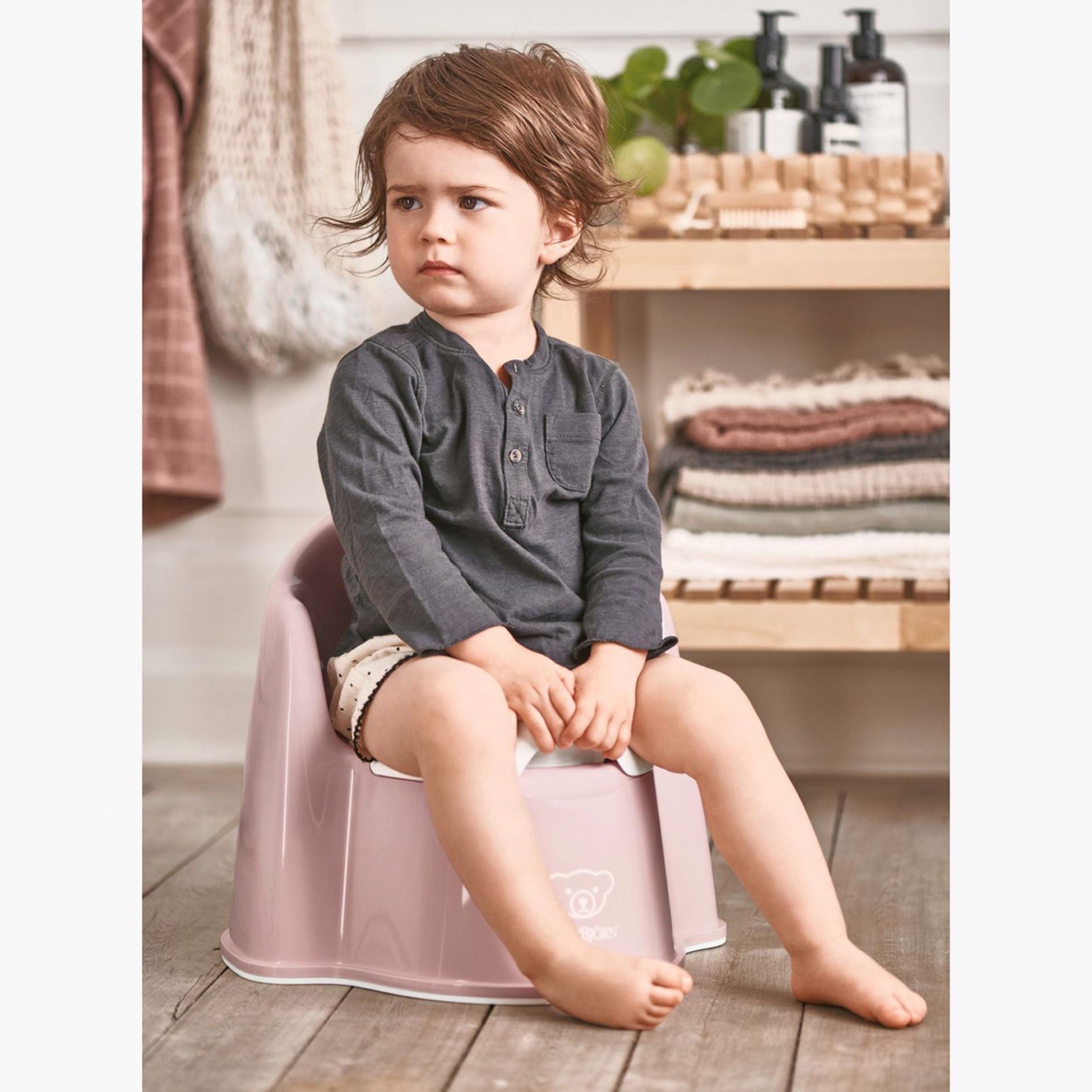 مقعد نونية من بيبي بيورن - وردي وأبيض-baby-diapering-pottytraining-image-2