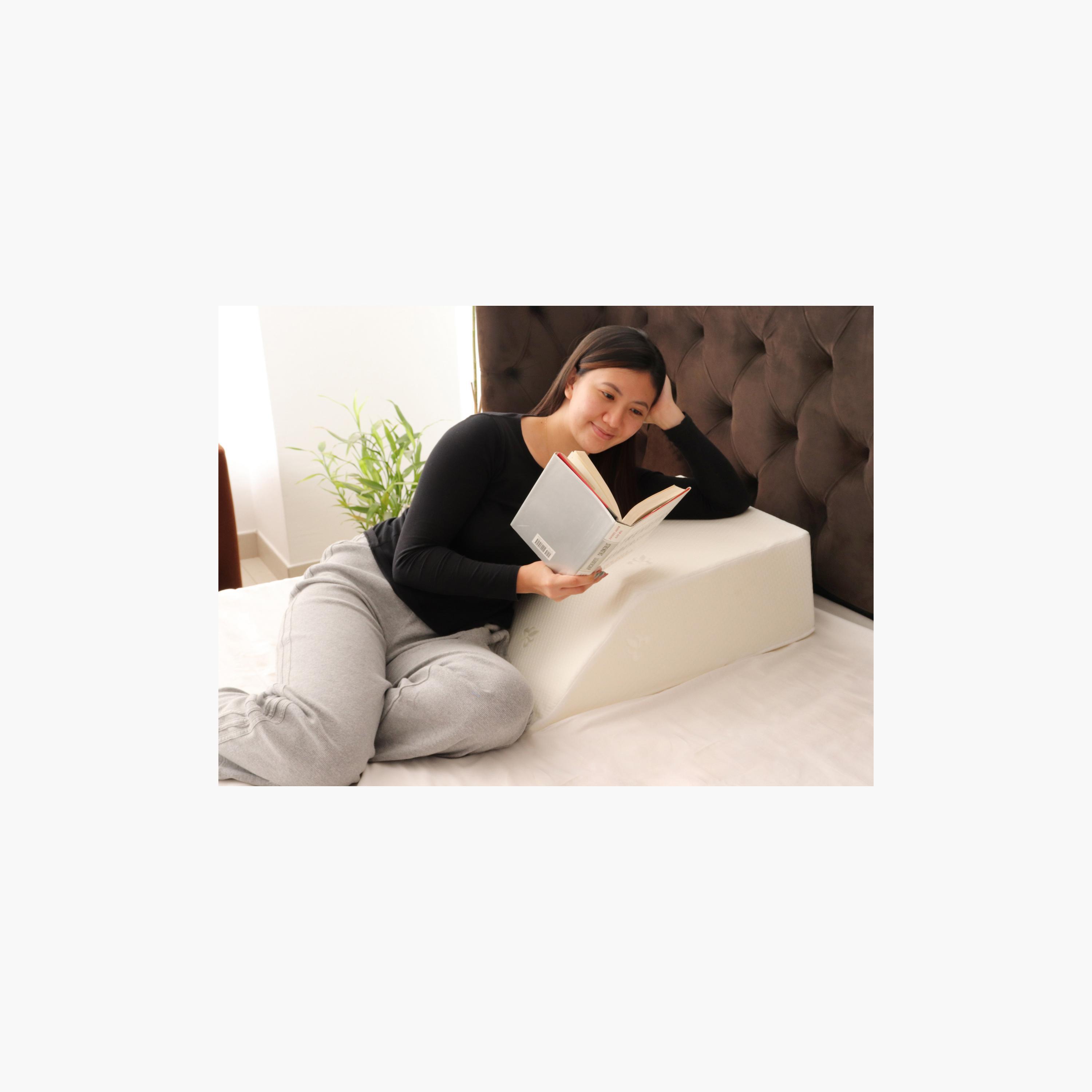 Elevated pillow best sale for baby