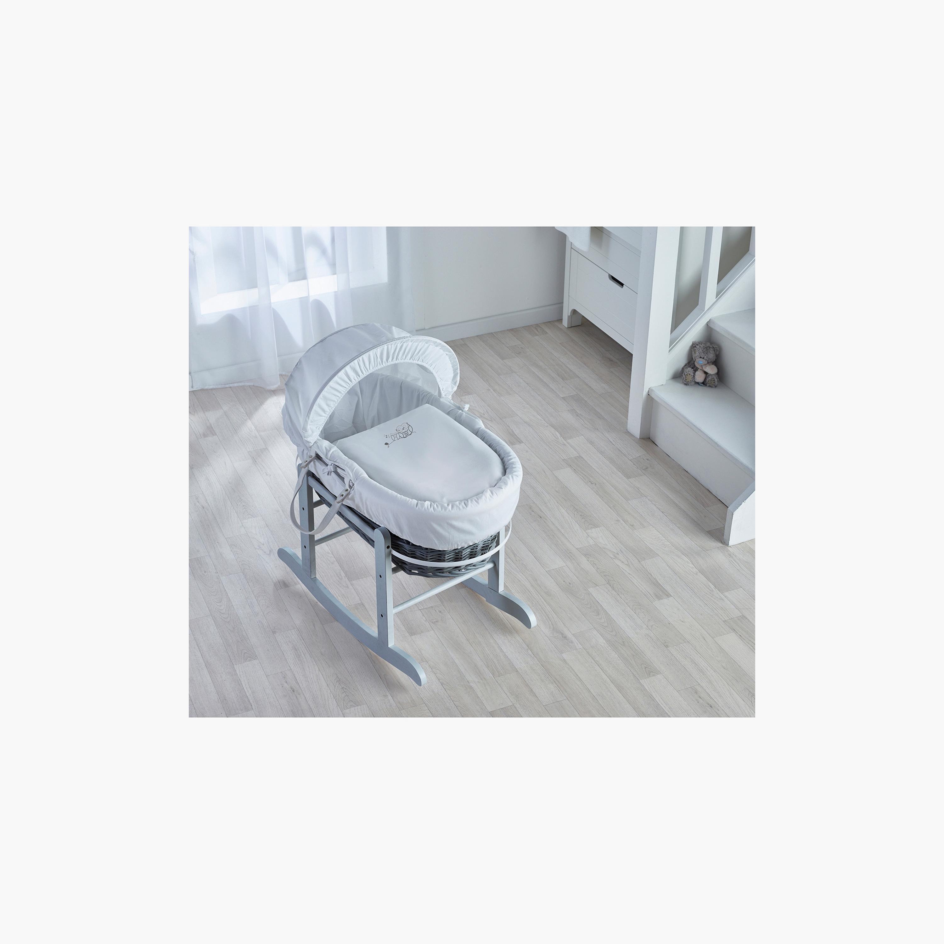 Moses basket on store floor