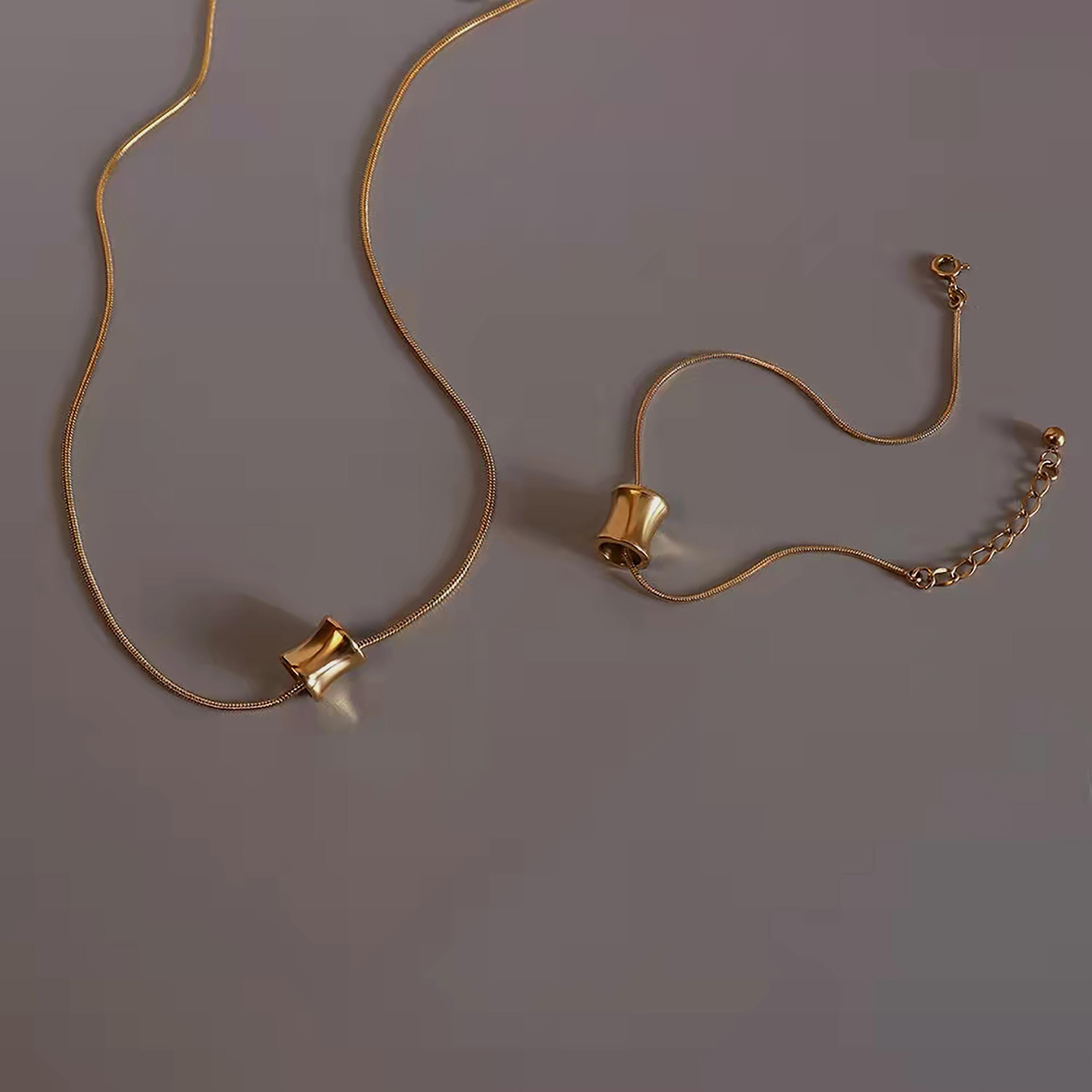 طقم قلادة وسوار ذهبي من الستانلس ستيل للنساء من لي كوبر - LC.S.01264.110-women-watchesandjewellery-jewellery-jewellerysets-image-3