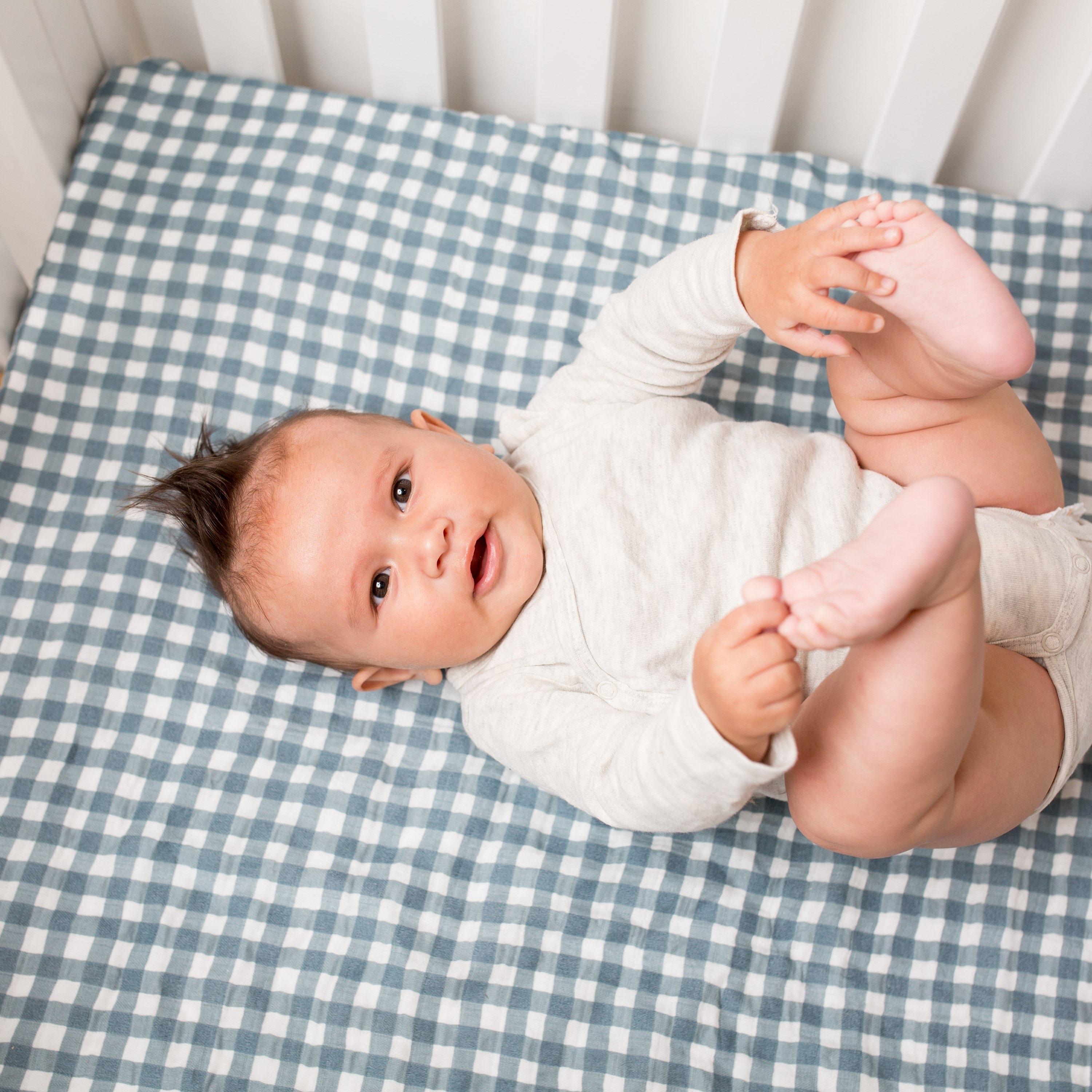 Navy gingham crib sheet on sale