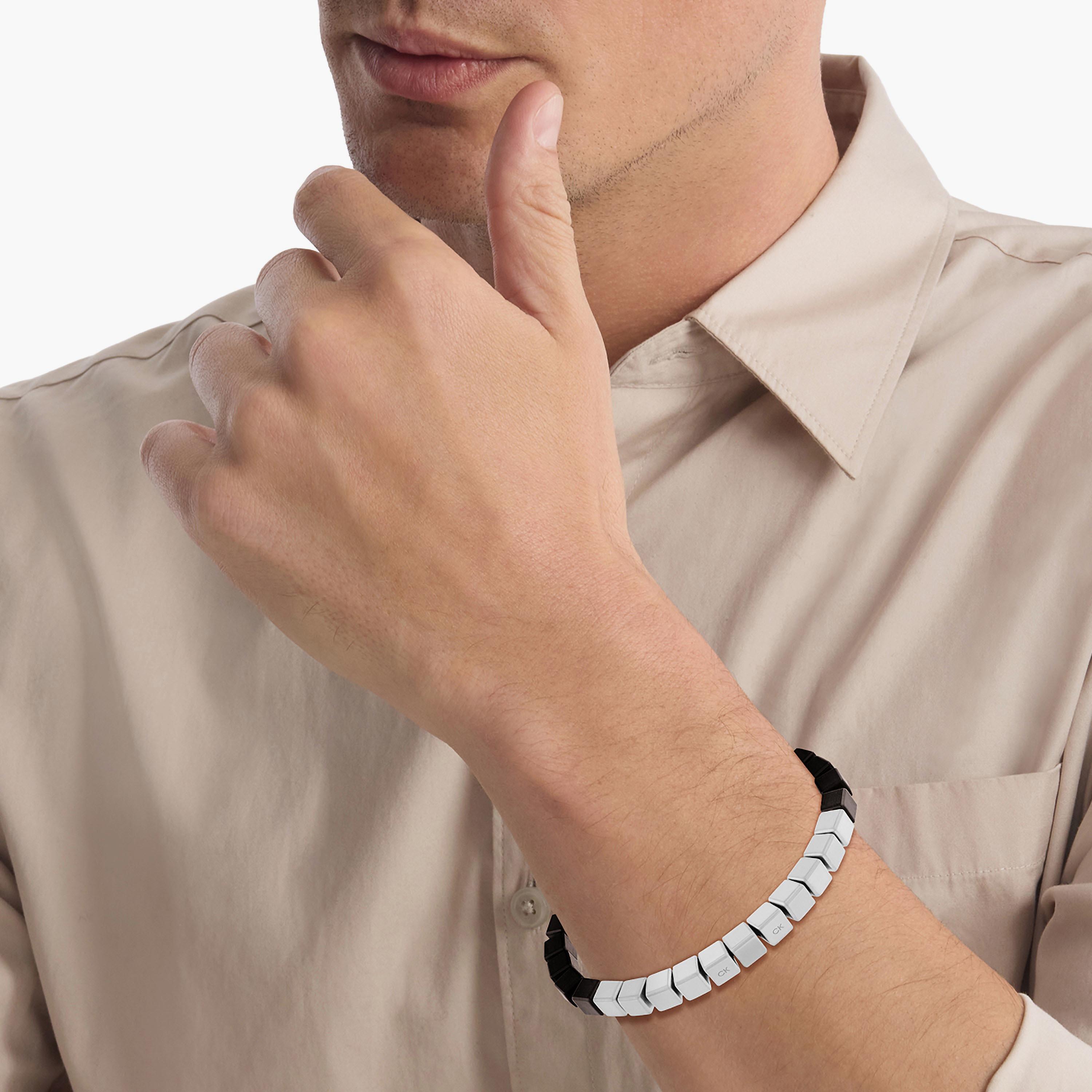 سوار مطرز ذو سي كيه من كالفن كلاين بلون اسود | 35000429-men-watchesandjewellery-bracelets-image-2