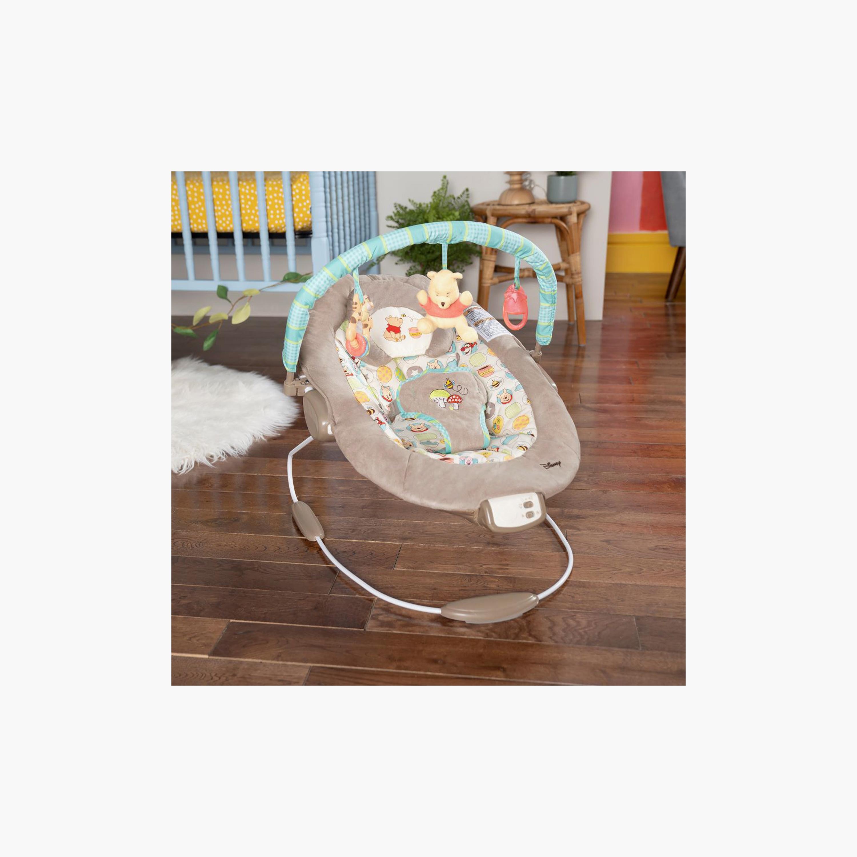 كرسي هزاز للأطفال ديزني ويني ذا بوه من برايت ستارتس - دوتس آند هاني بوتس-baby-infantactivity-bouncers-image-4