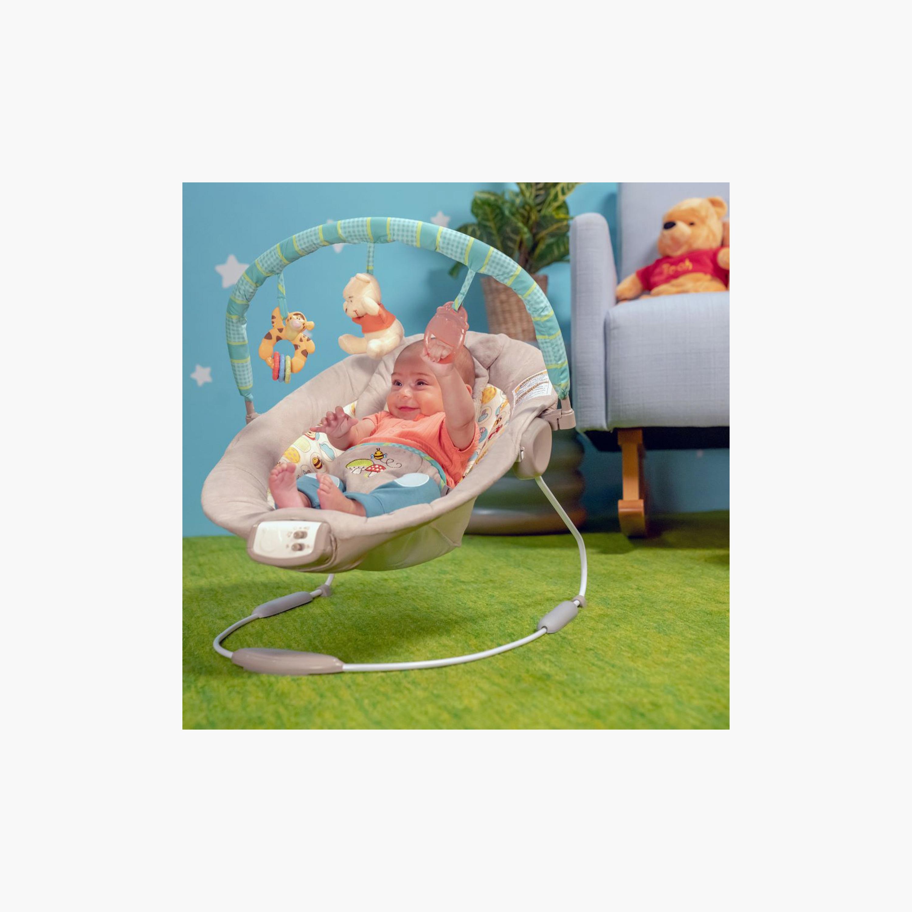 كرسي هزاز للأطفال ديزني ويني ذا بوه من برايت ستارتس - دوتس آند هاني بوتس-baby-infantactivity-bouncers-image-5