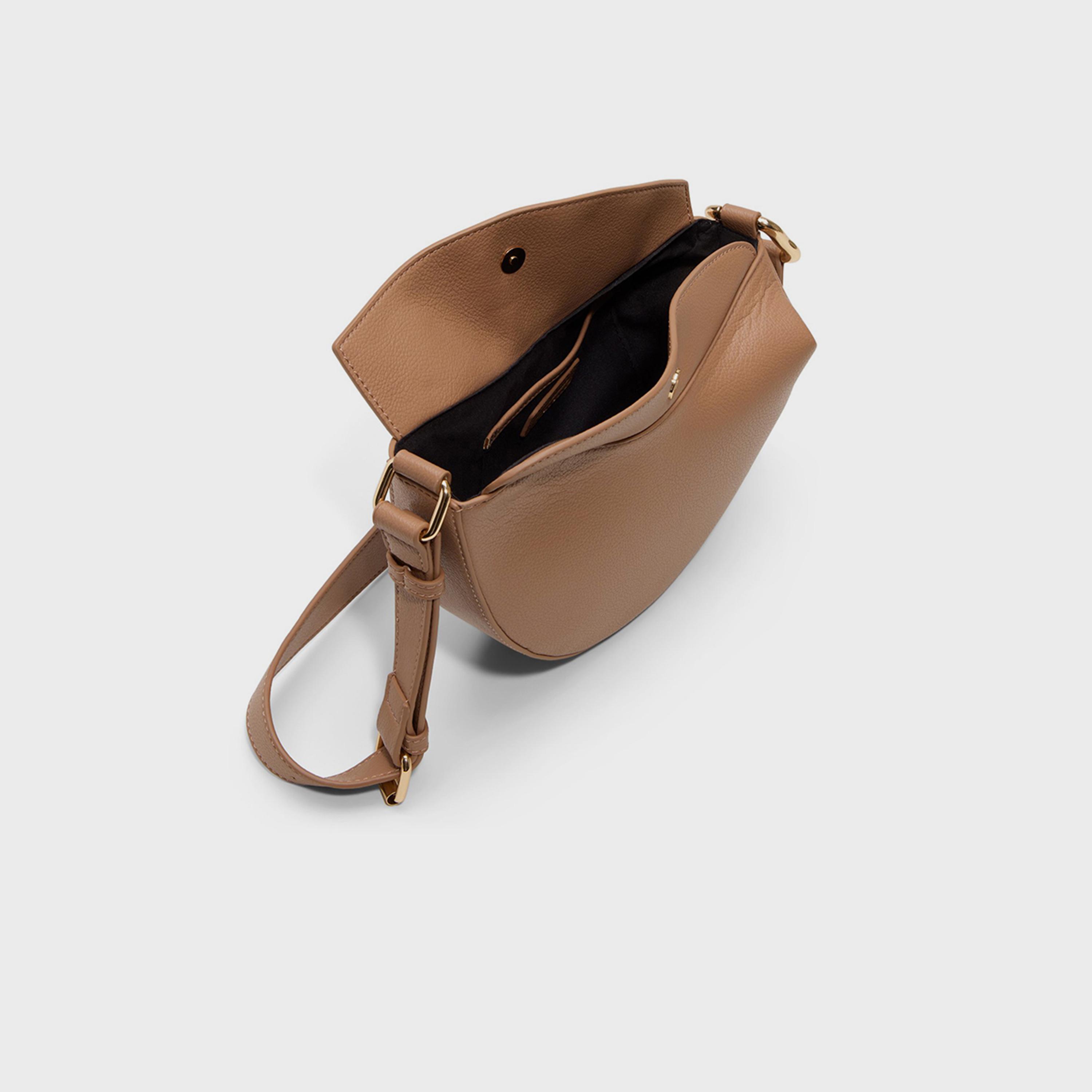 كول ات سبرينغ- شنطة كروس منقوشة إغلاق مغناطيسي وحزام قابل للتعديل | 26 × 22 × 11 سم-women-bagsandwallets-handbags-image-6