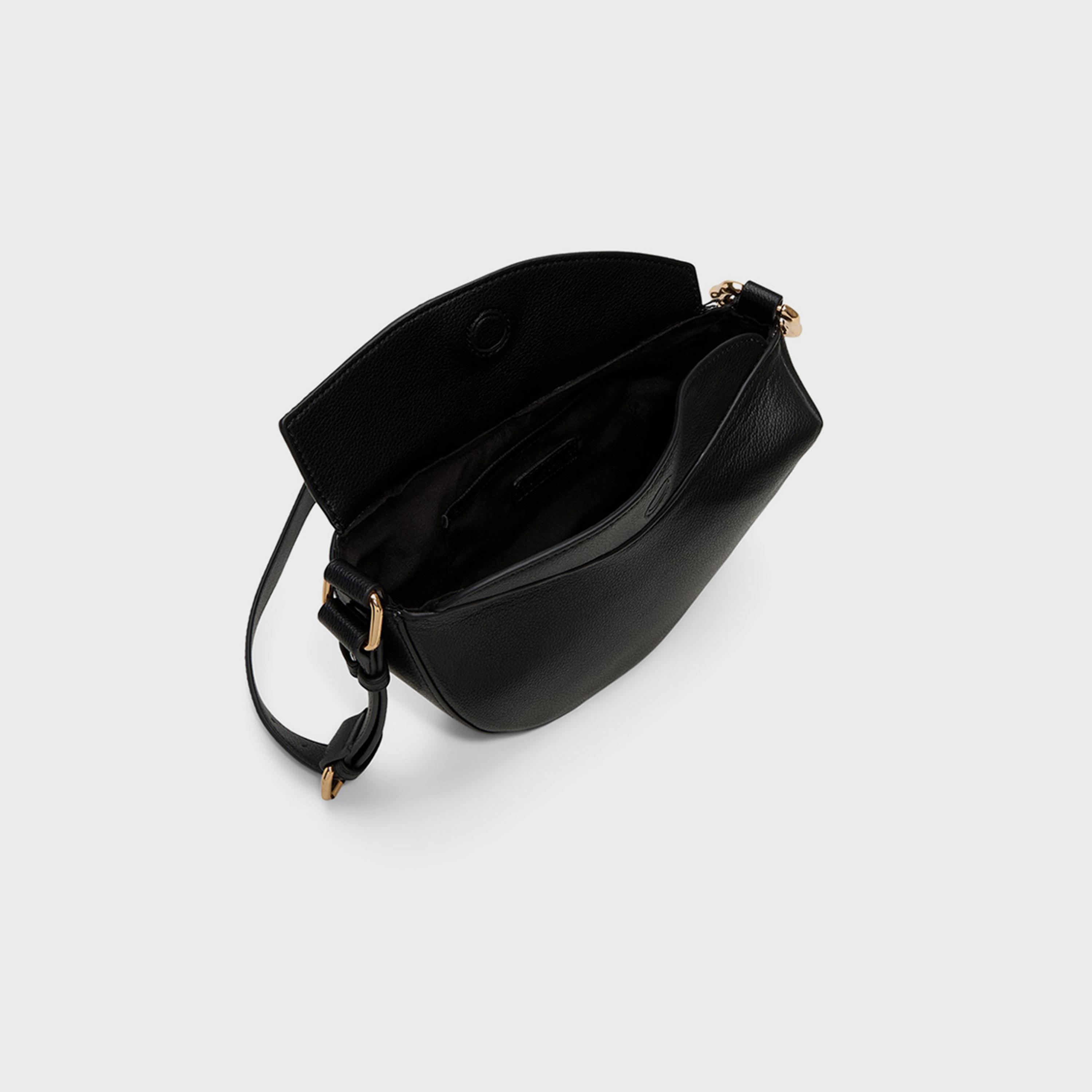 كول ات سبرينغ- شنطة كروس منقوشة إغلاق مغناطيسي وحزام قابل للتعديل | 26 × 22 × 11 سم-women-bagsandwallets-handbags-image-9