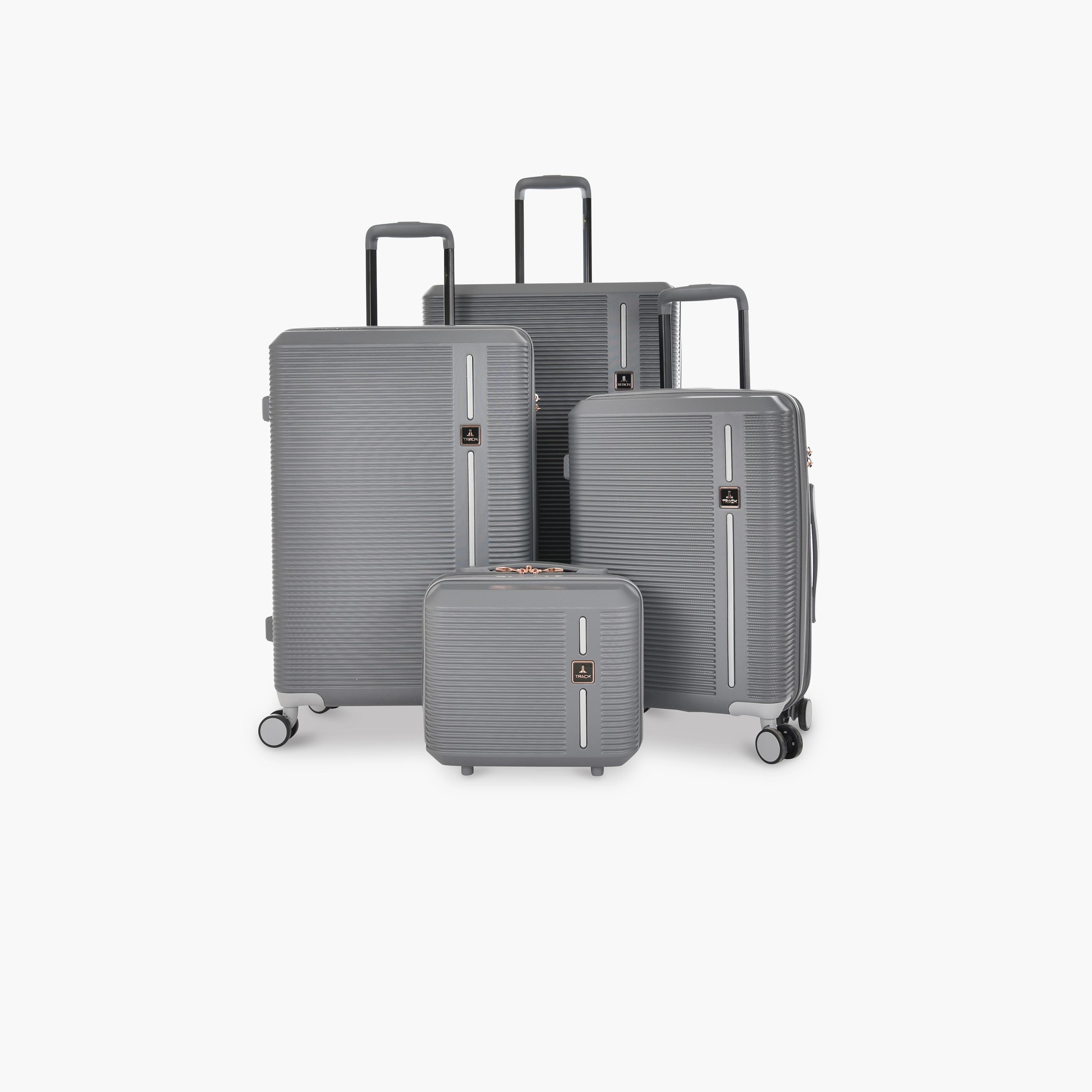 تراك - طقم  4 شنط بجوانب صلبة من مادة ABS وأربع عجلات دوارة مع قفل مركب-travel-luggagesandbags-luggage-image-1