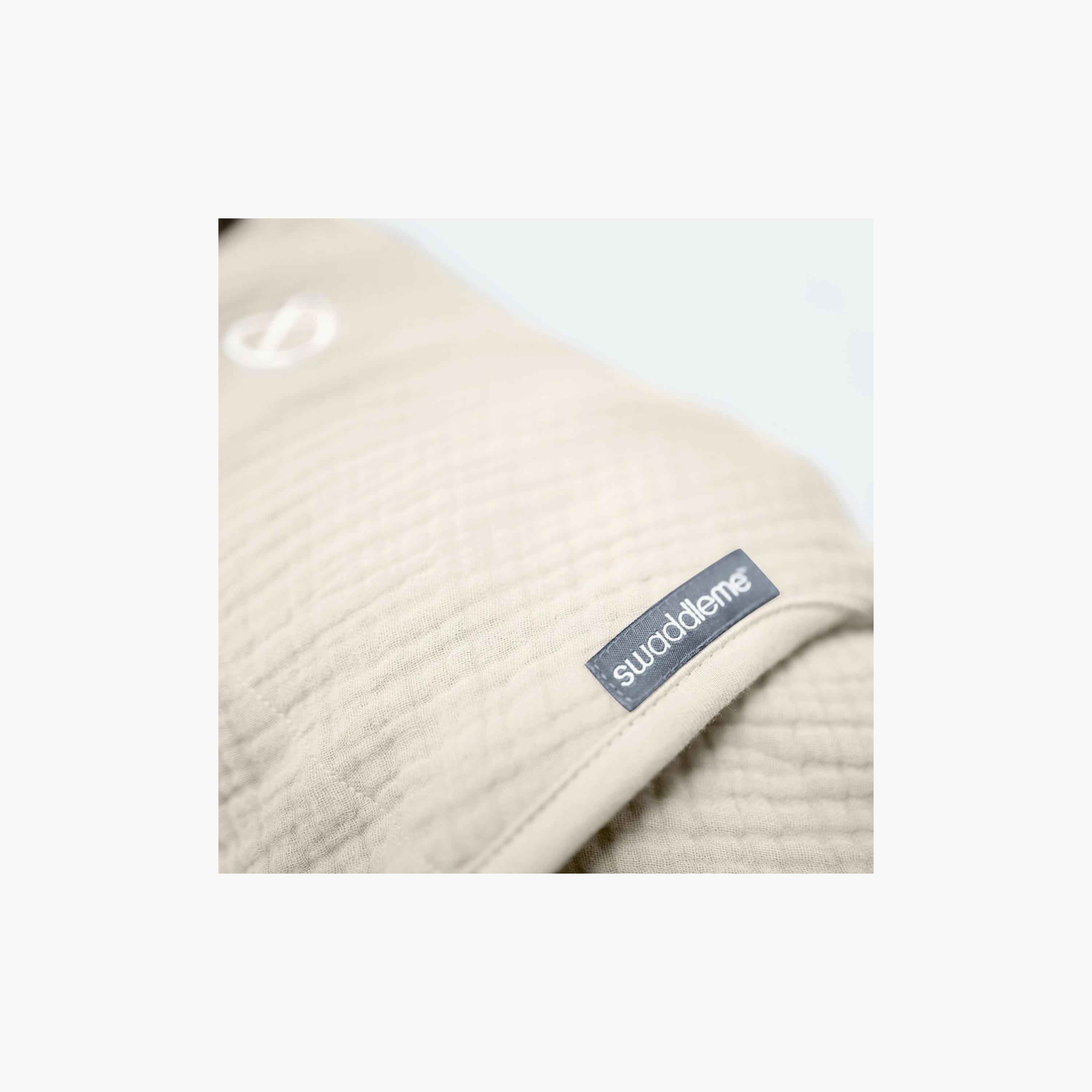 قماط سوادل مي الموسلين الأصلي - 0-3 أشهر - كريمي من إنجوينيتي-baby-nursery-blanketsandswaddles-swaddlesandsleepingbags-image-5